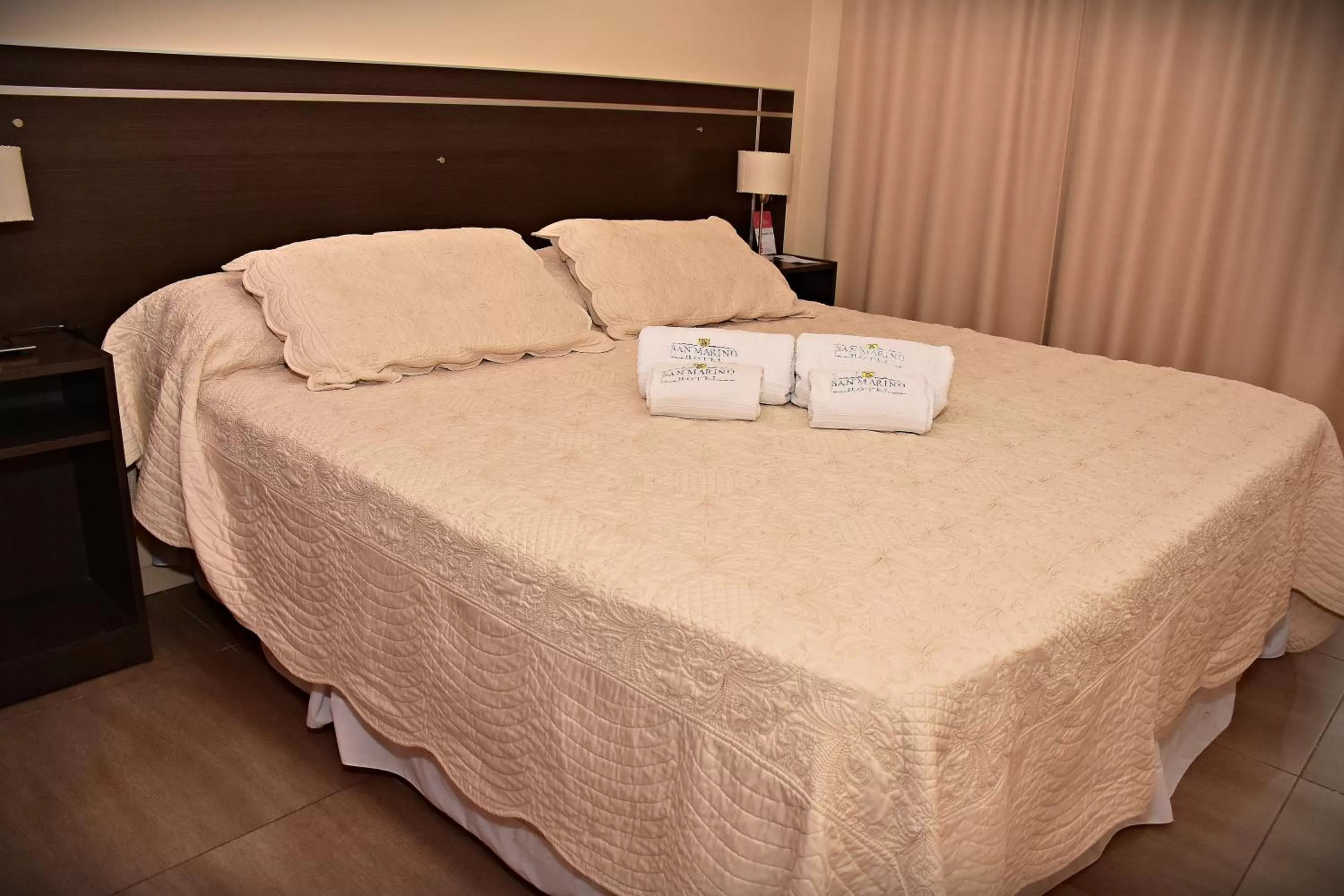 Bed in Hotel San Marino