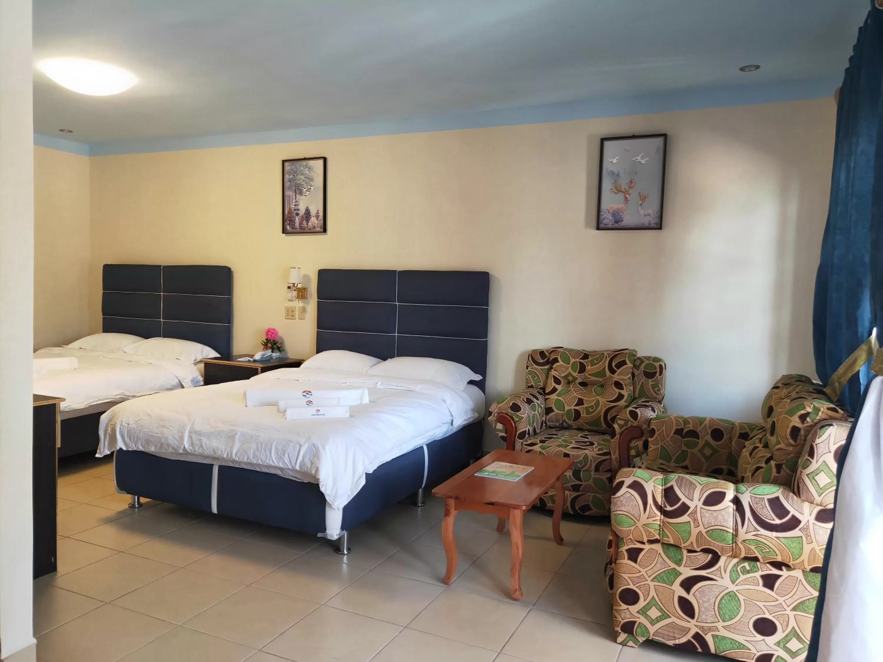 Bedroom, Bed in Sunshine View Hotel and Restaurant