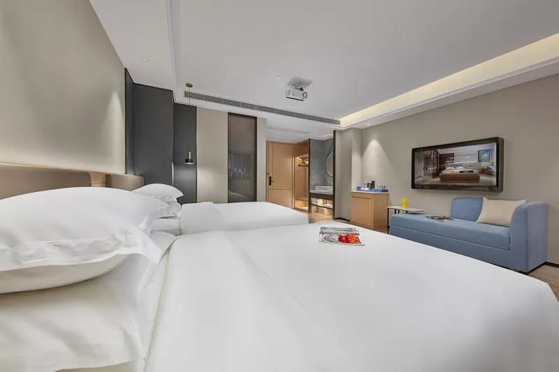 Bed in Fengyue Light Shang Hotel Guangzhou Baiyun Airport Store