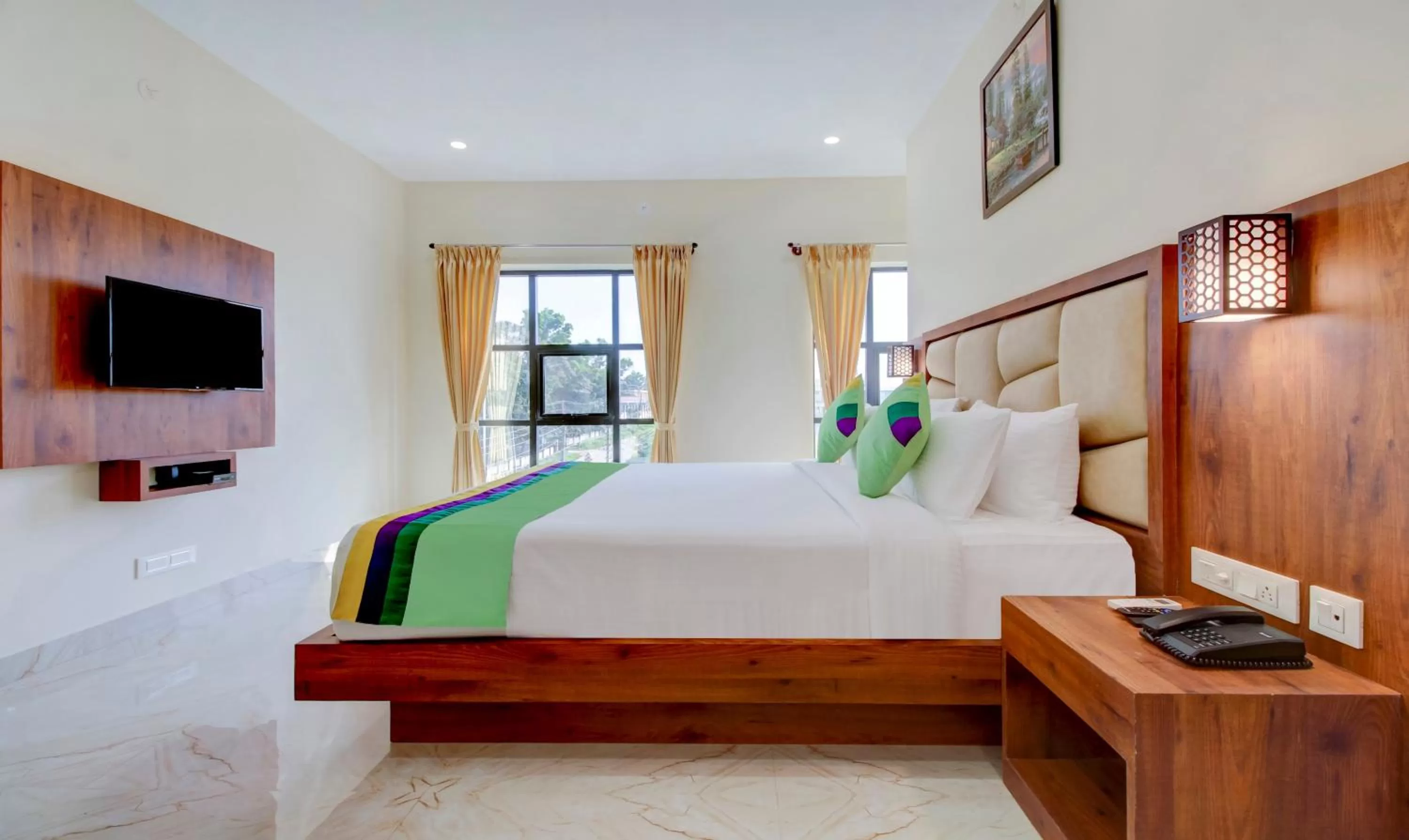 Bedroom, Bed in Treebo The Meridian