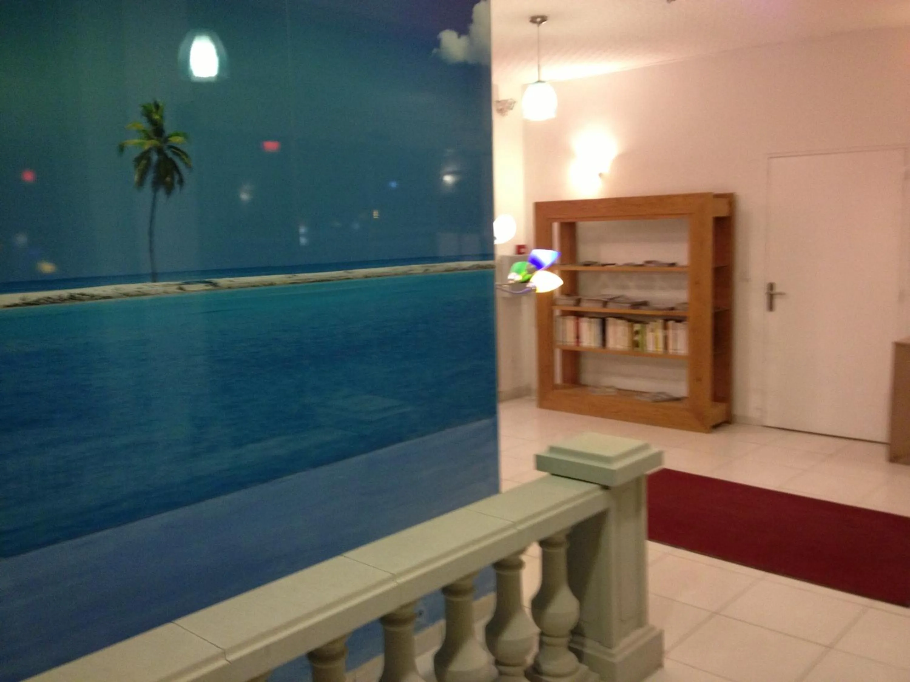 Lobby or reception in Hotel Couleurs Sud Centre-ville Gare Charleville-Mézières