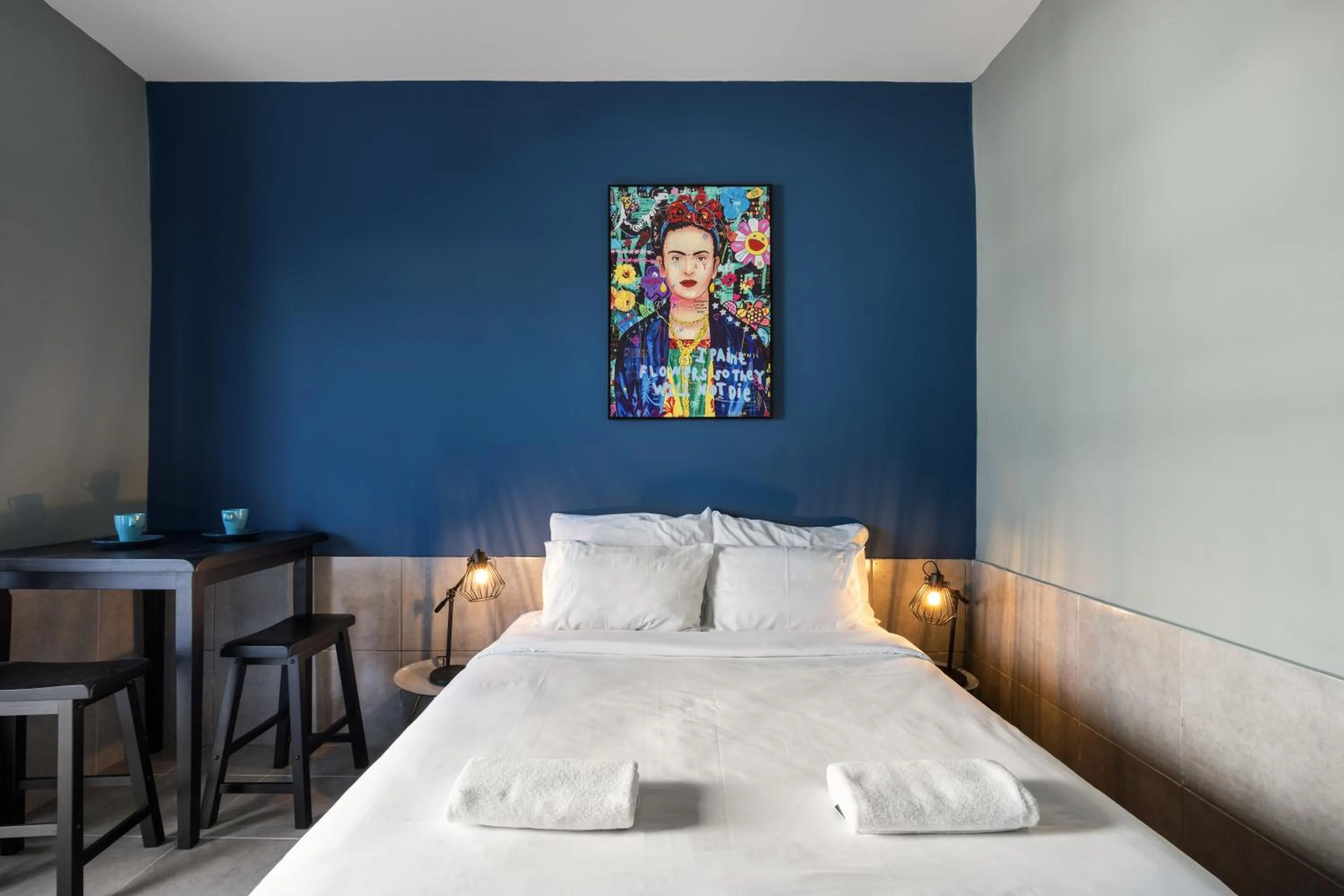 Bed in Liber Tel Aviv Sea Shore Suites BY RAPHAEL HOTELS