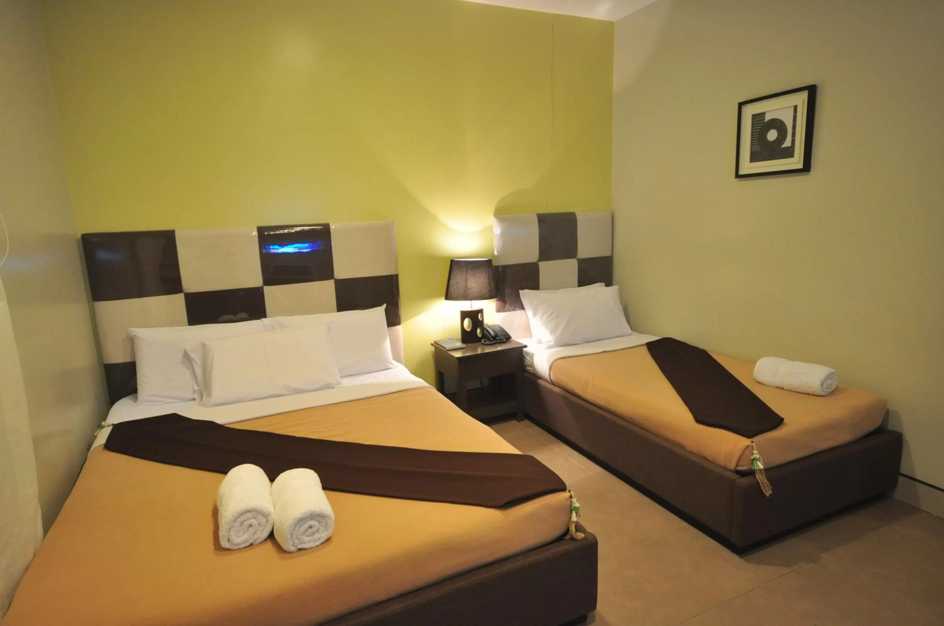 Bed in Grande Vista Hotel