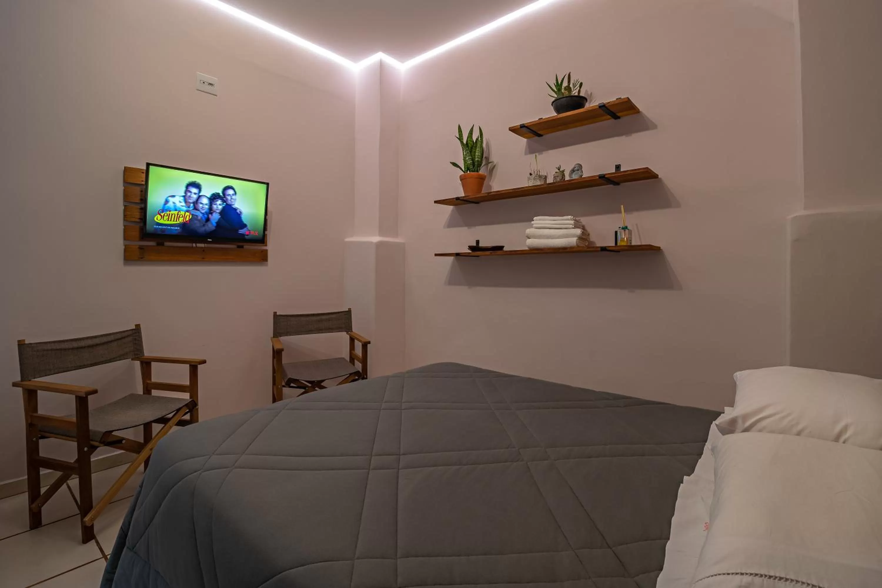 TV/Entertainment Center in Suítes no Quintal