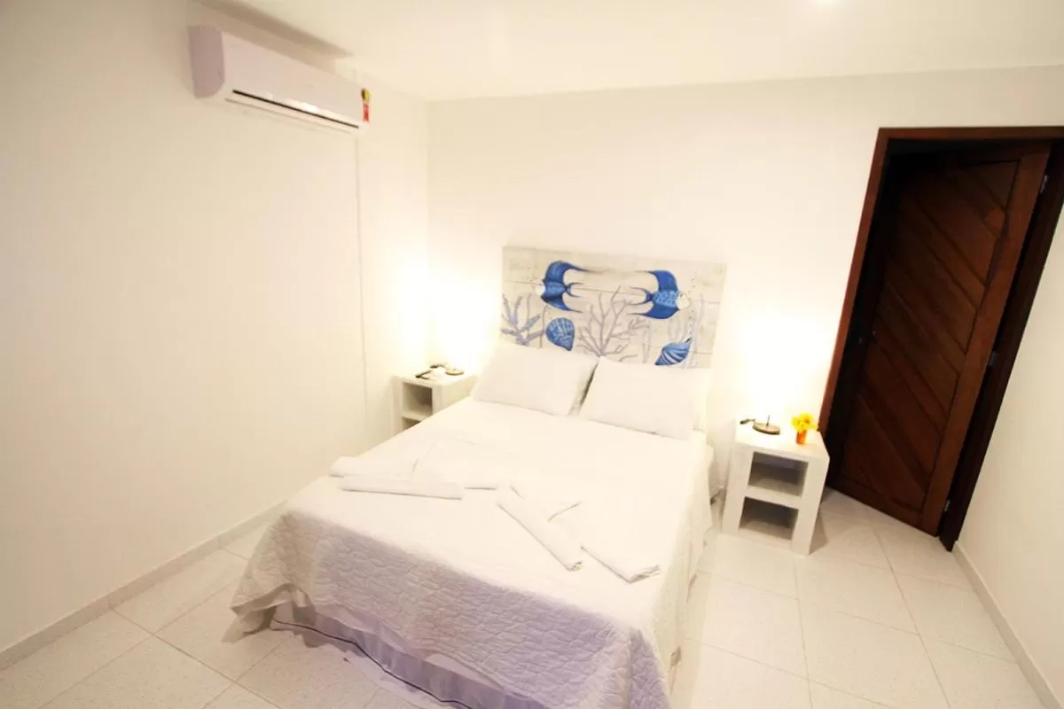 Bed, Room Photo in Pousada Recanto da Praia