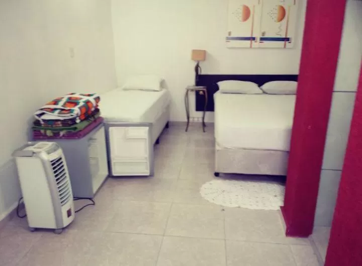 Bed in Pousada Villas