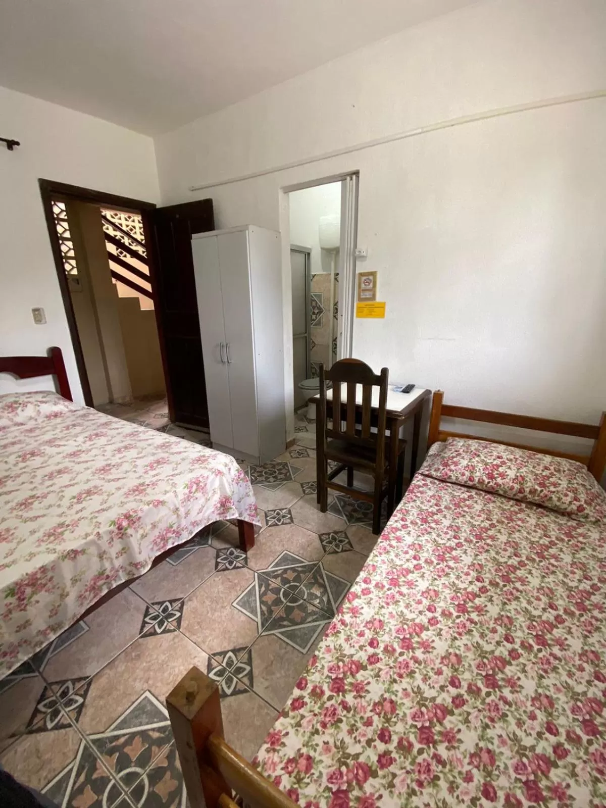 Bed in Pousada Canoas