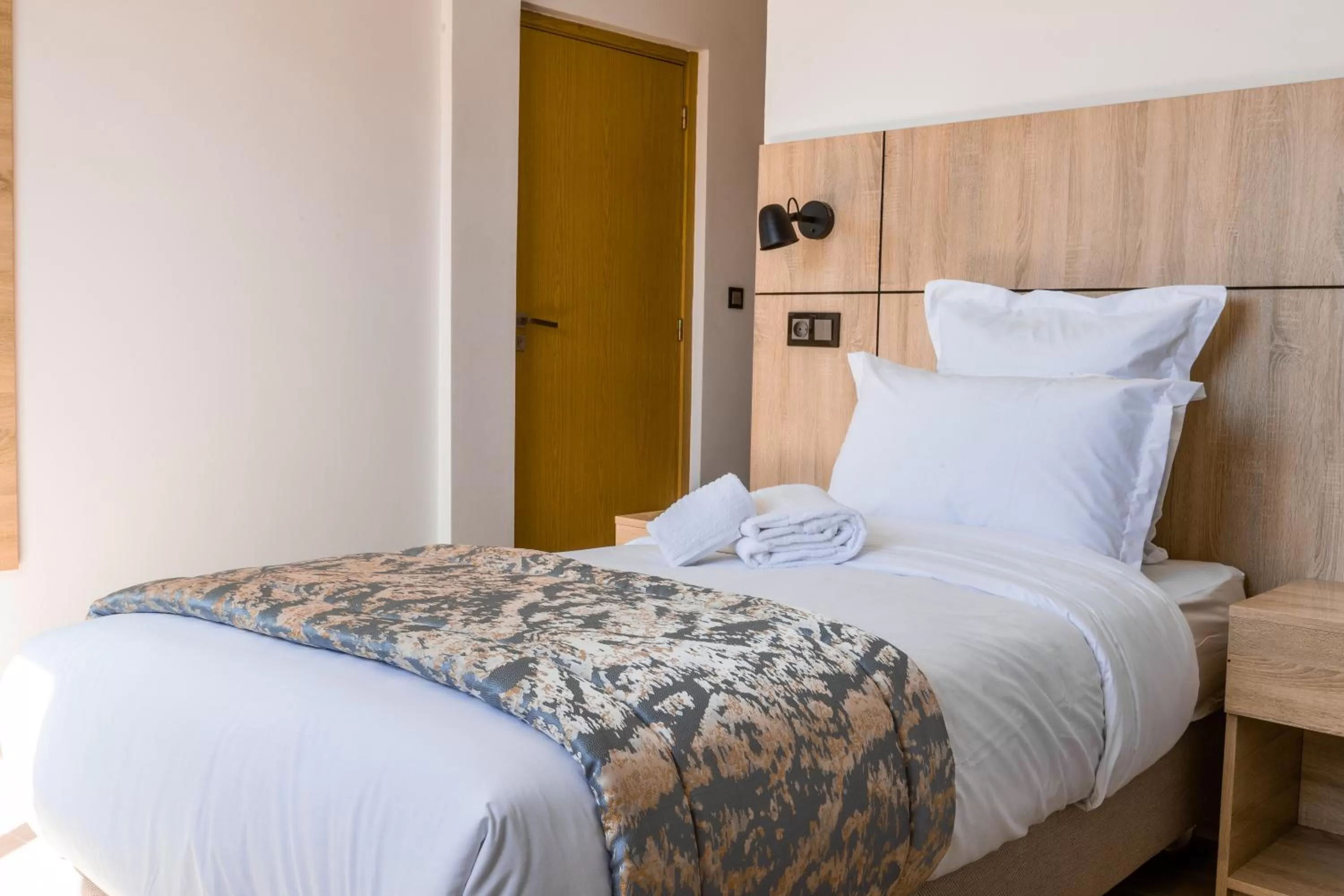 Bed in Karam City Hotel