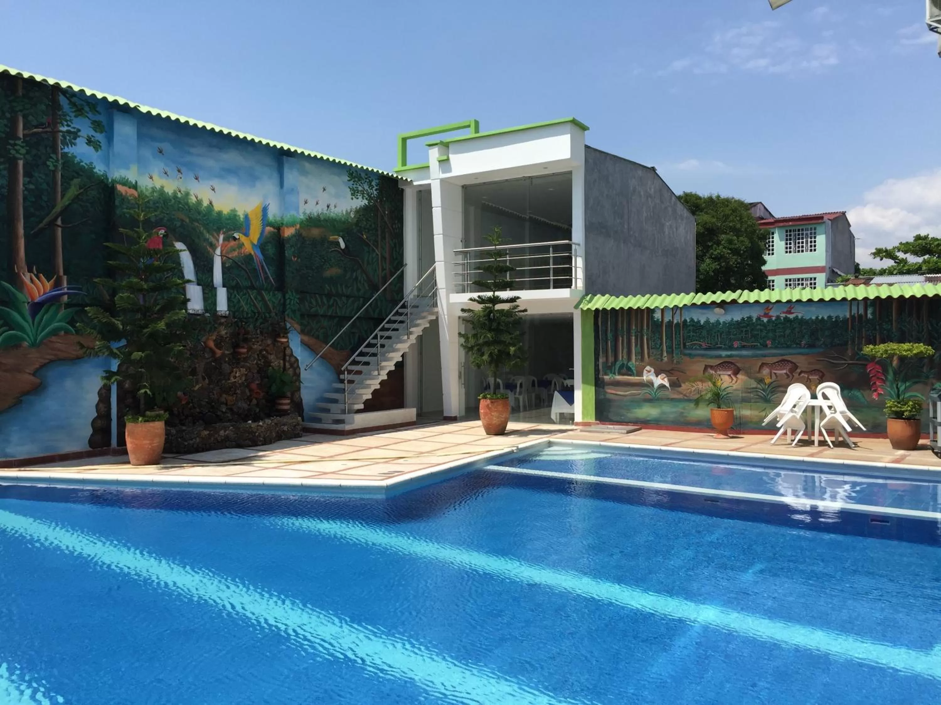 Swimming pool, Property Building in Hotel Caquetá Real HSC