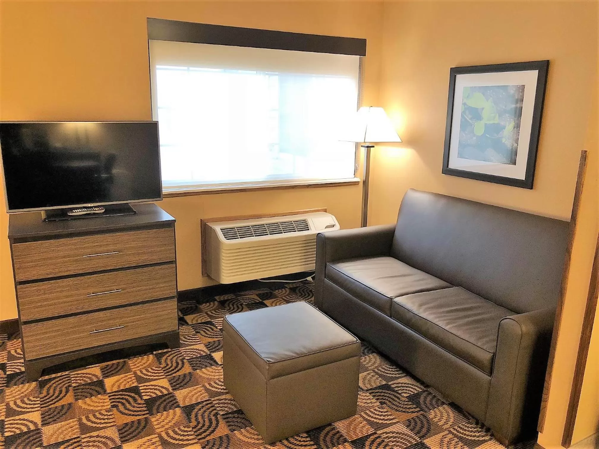 Living room in Hawthorn Extended Stay by Wyndham Milwaukee Airport