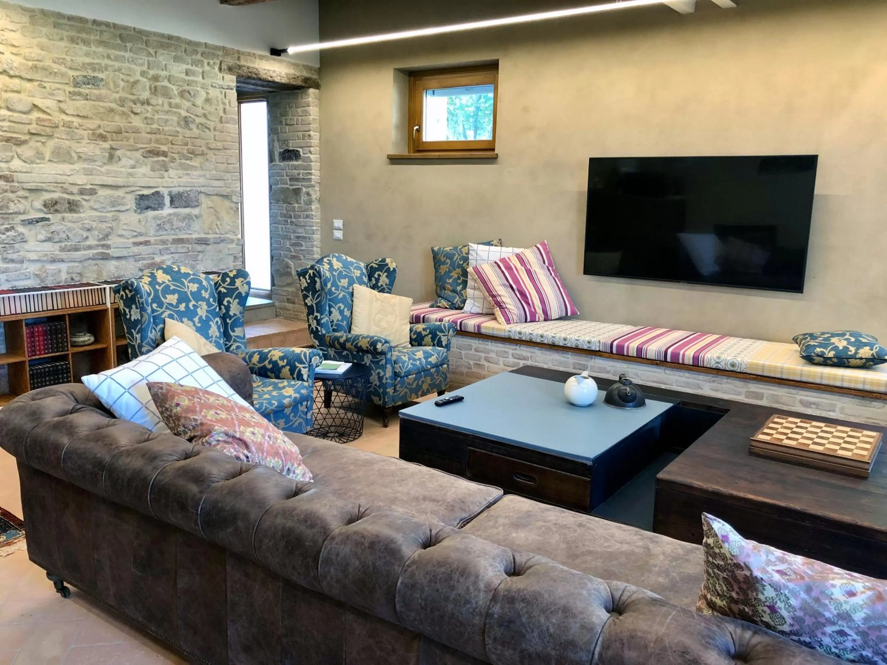 Communal lounge/ TV room, Seating Area in Dai Ventu