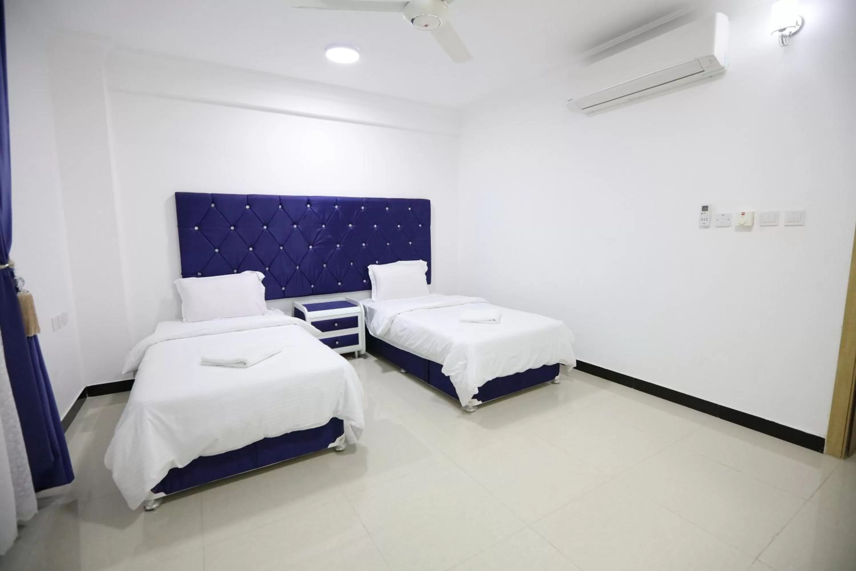 Bed in Al Rayyan Hotel Apartments Muscat