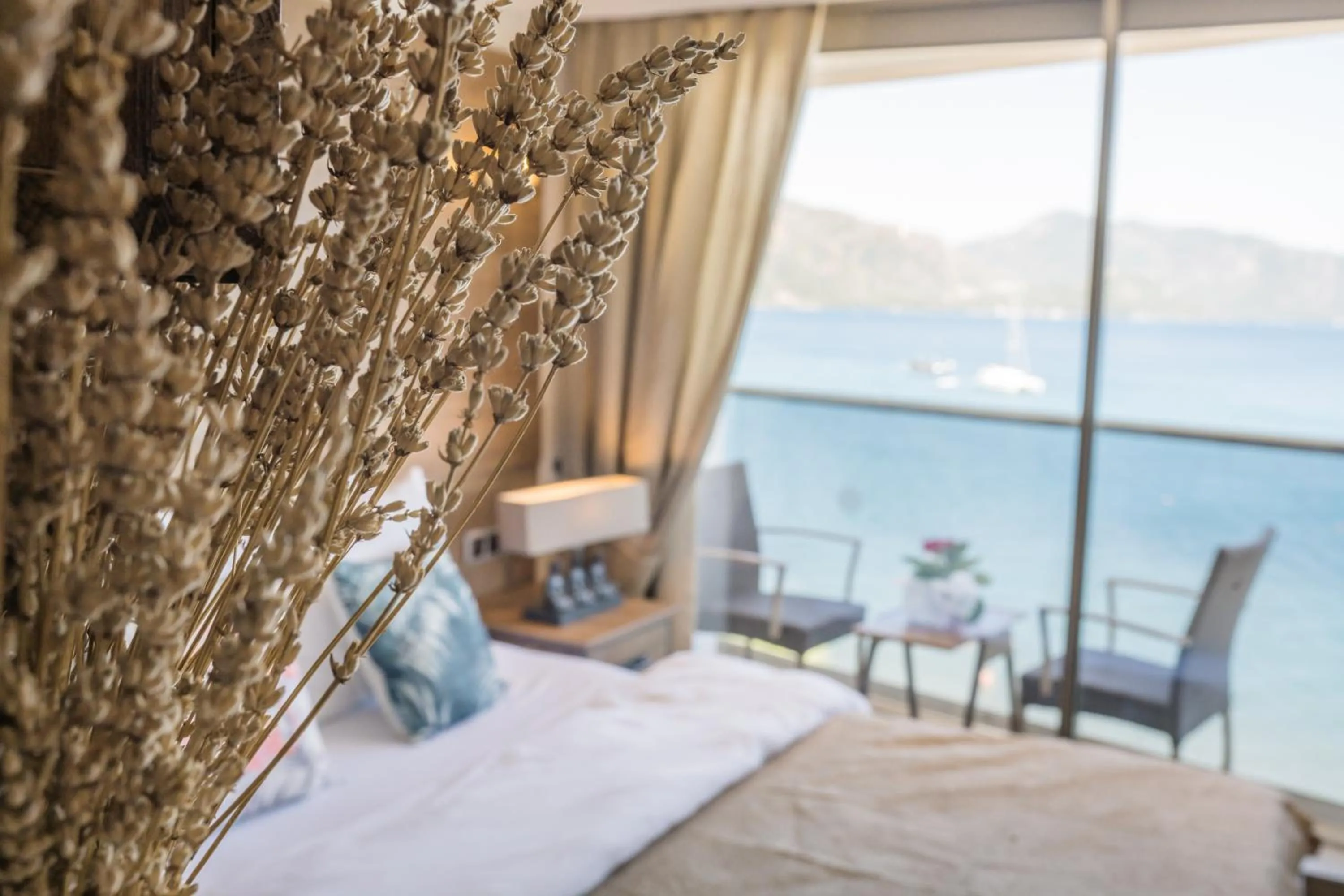 Bed in Aurasia Beach Hotel