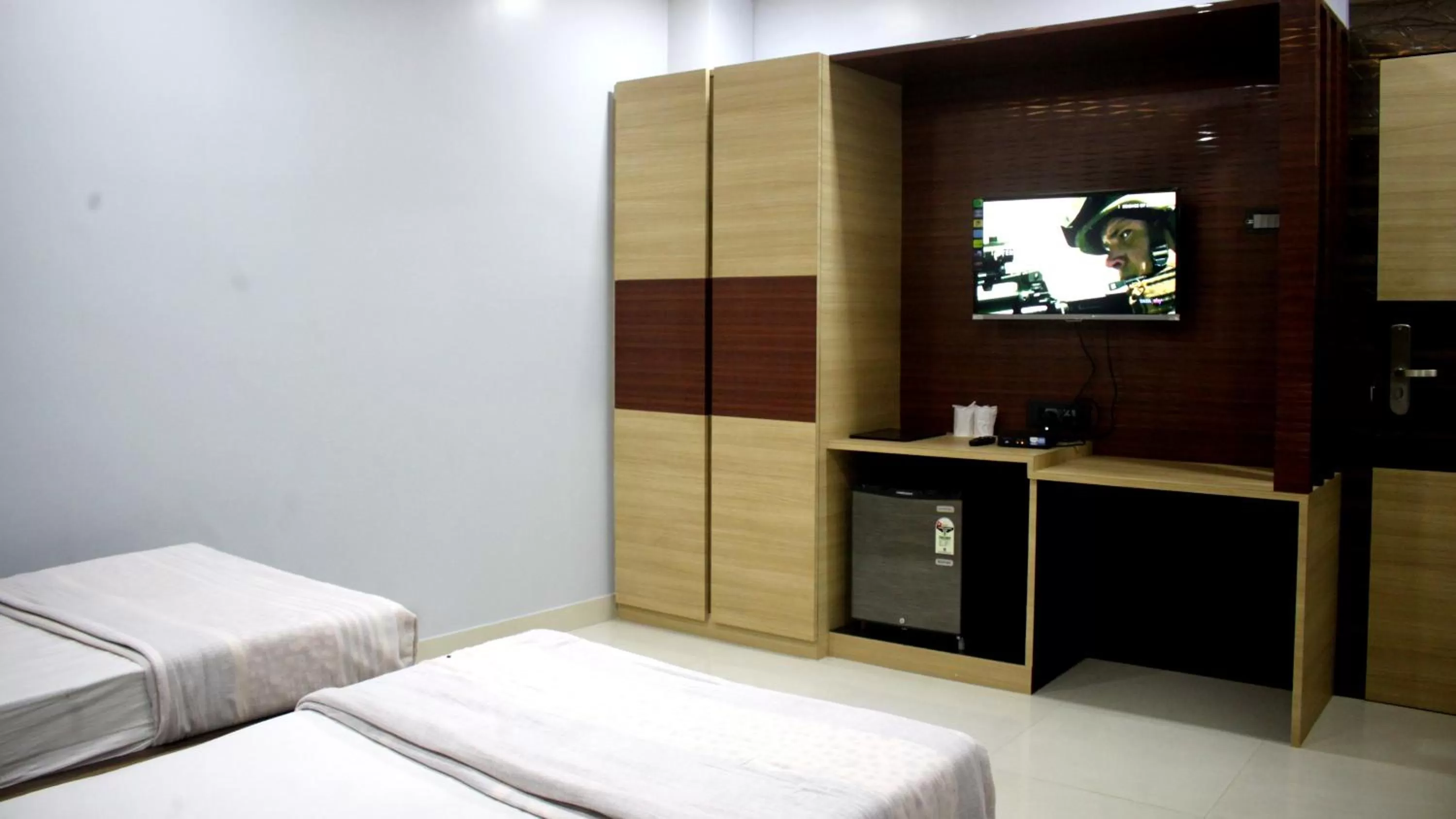 Bed in Hotel Shreemoyee Inn - Kamakhya Temple