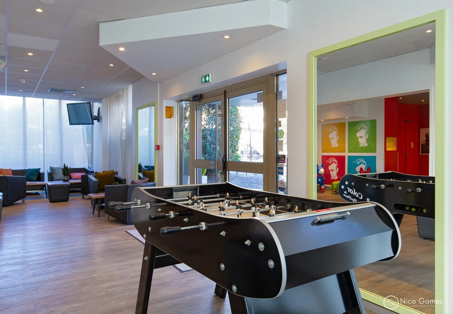 Communal lounge/ TV room in ibis Styles Cannes Le Cannet