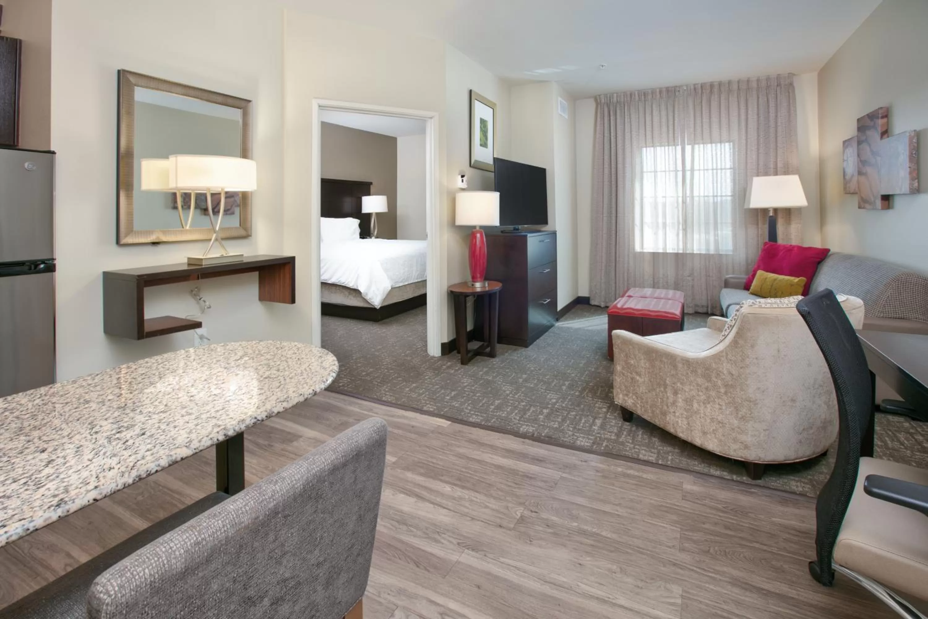 Communal lounge/ TV room, Bed in Staybridge Suites Plano - Richardson Area by IHG
