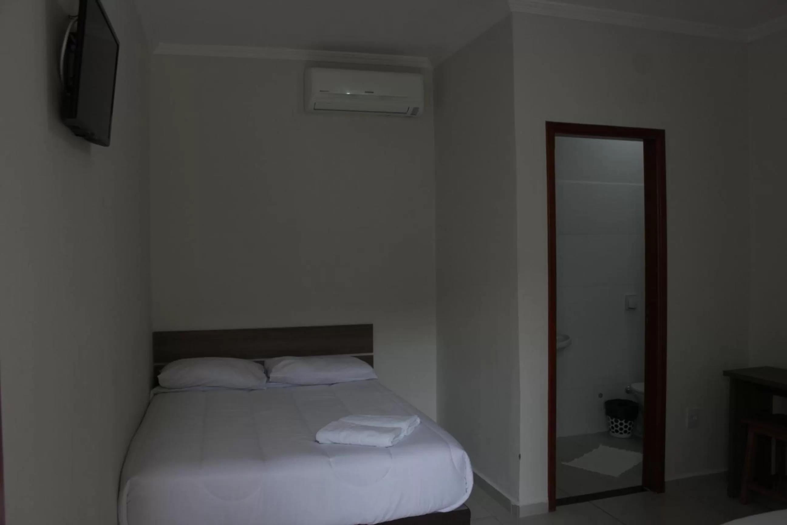 Bed in Leati's Hotel