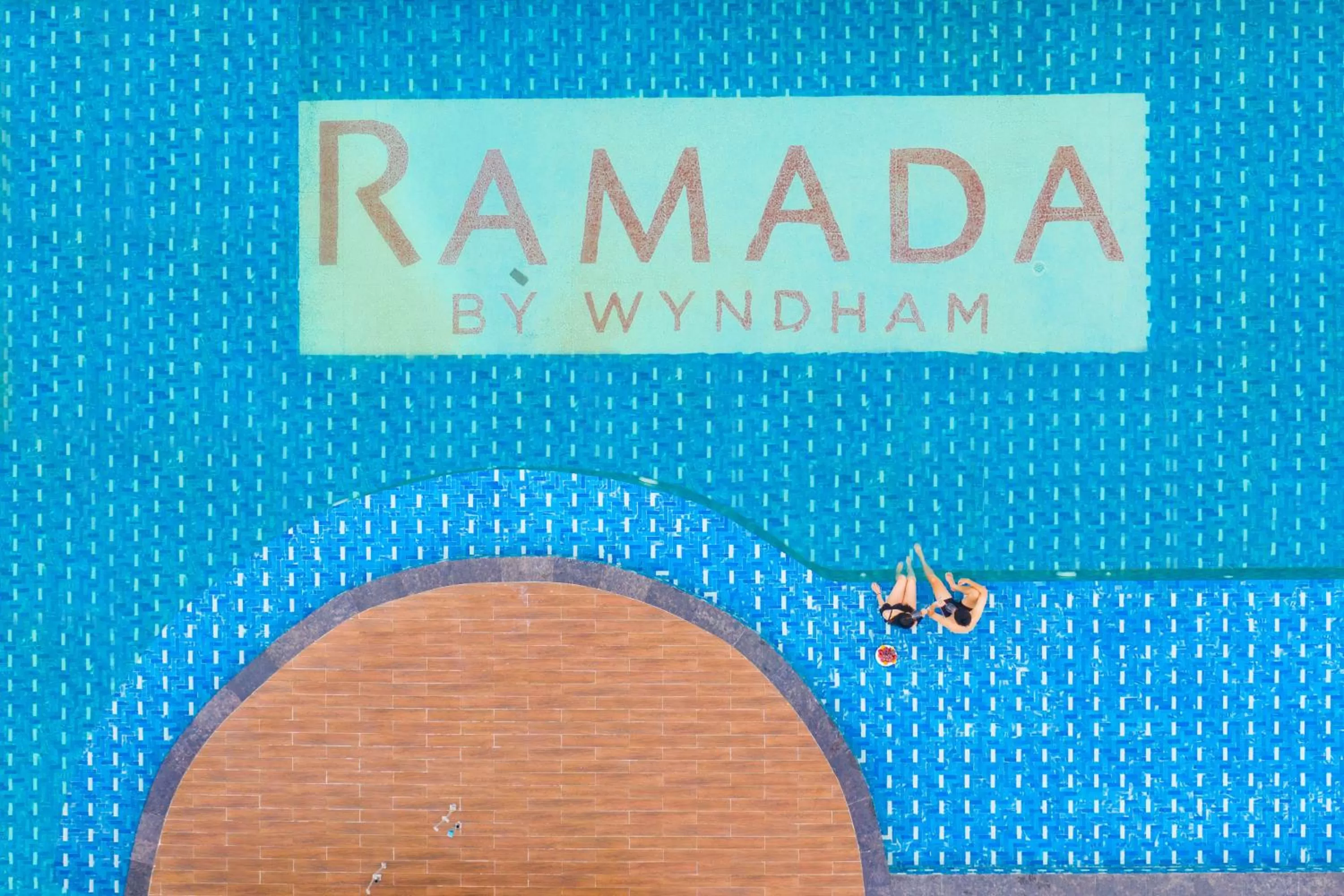 Swimming pool in Ramada Hotel & Suites by Wyndham Halong Bay View