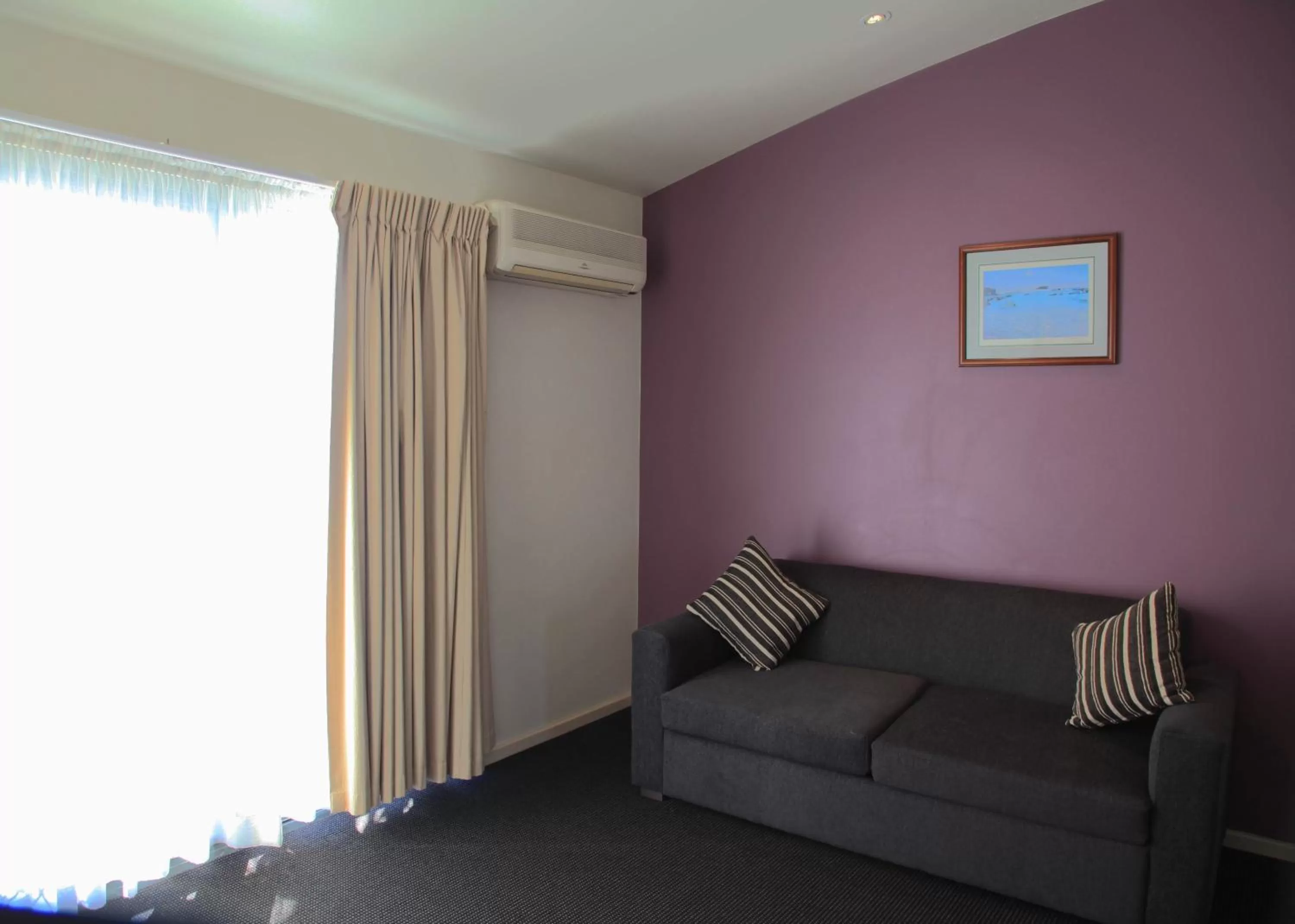 Living room in Travellers Motor Village