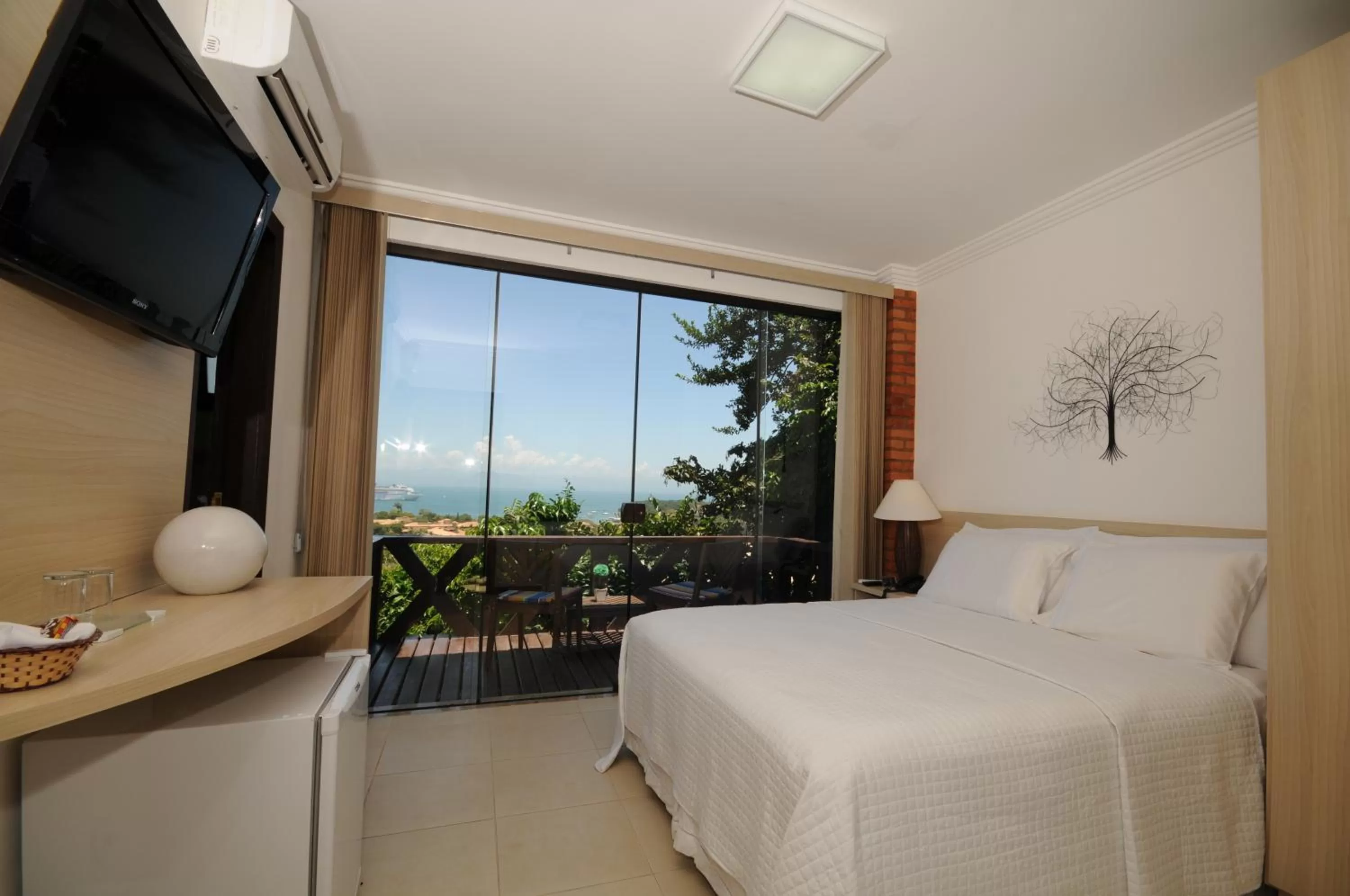 Bed in Costa do Sol Boutique Hotel