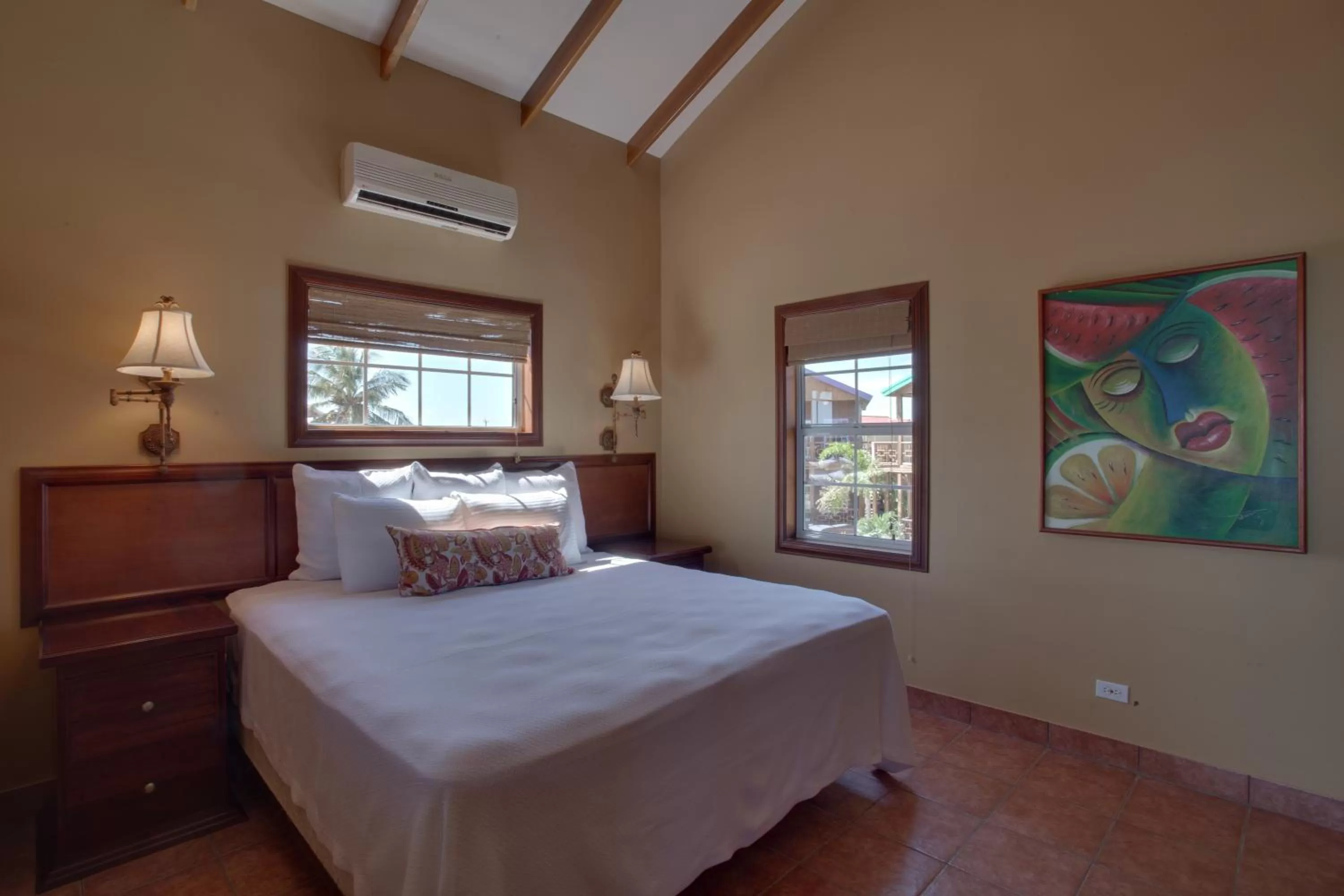 Photo of the whole room, Bed in X'tan Ha- The Waterfront