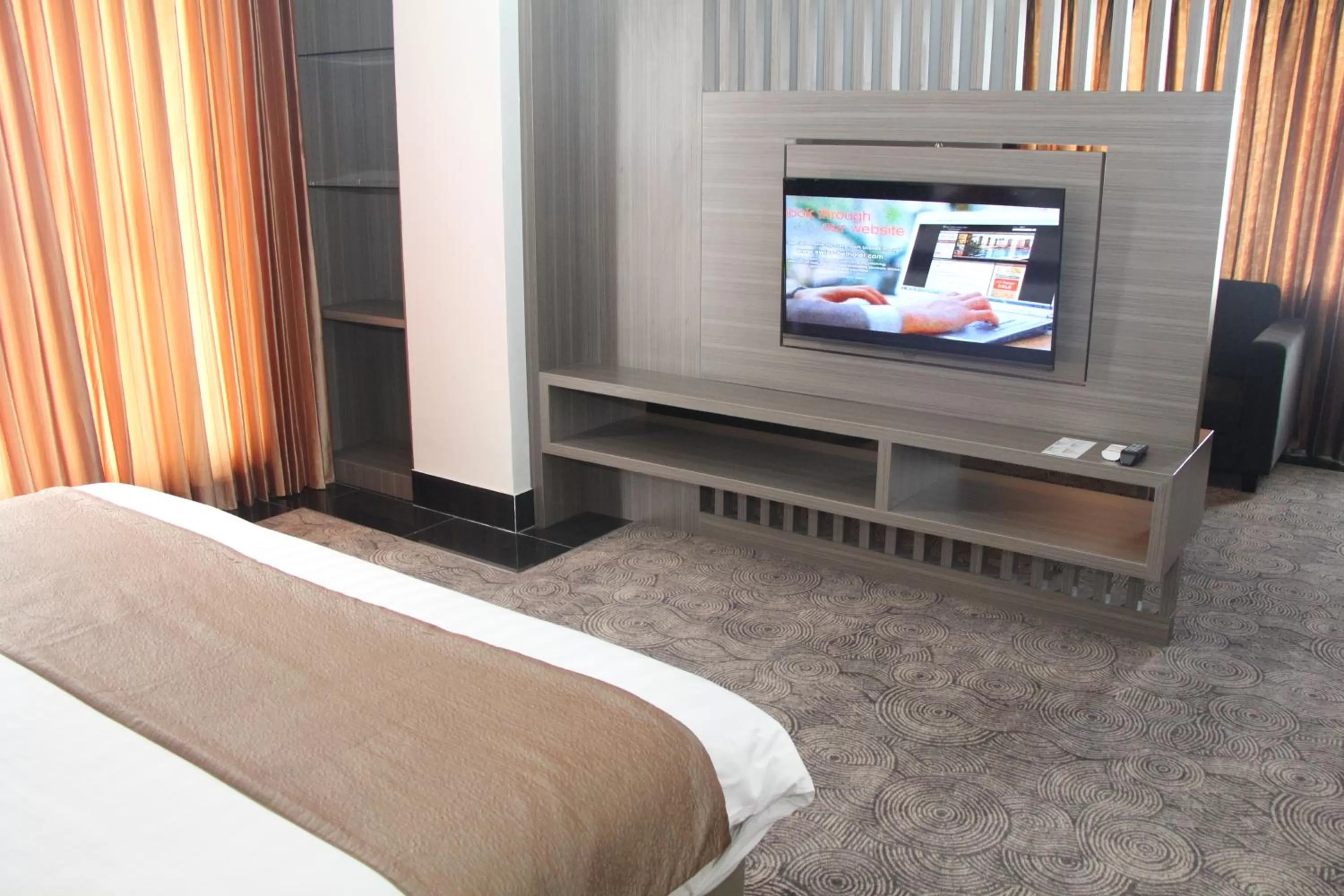 TV and multimedia, Bed in Swiss-Belhotel Borneo Samarinda