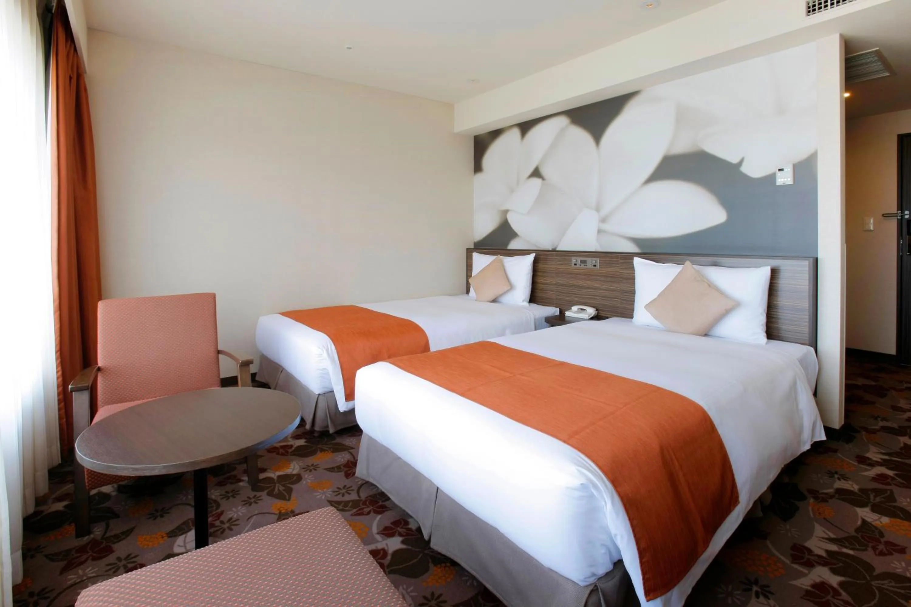 Bed in Okinawa NaHaNa Hotel & Spa