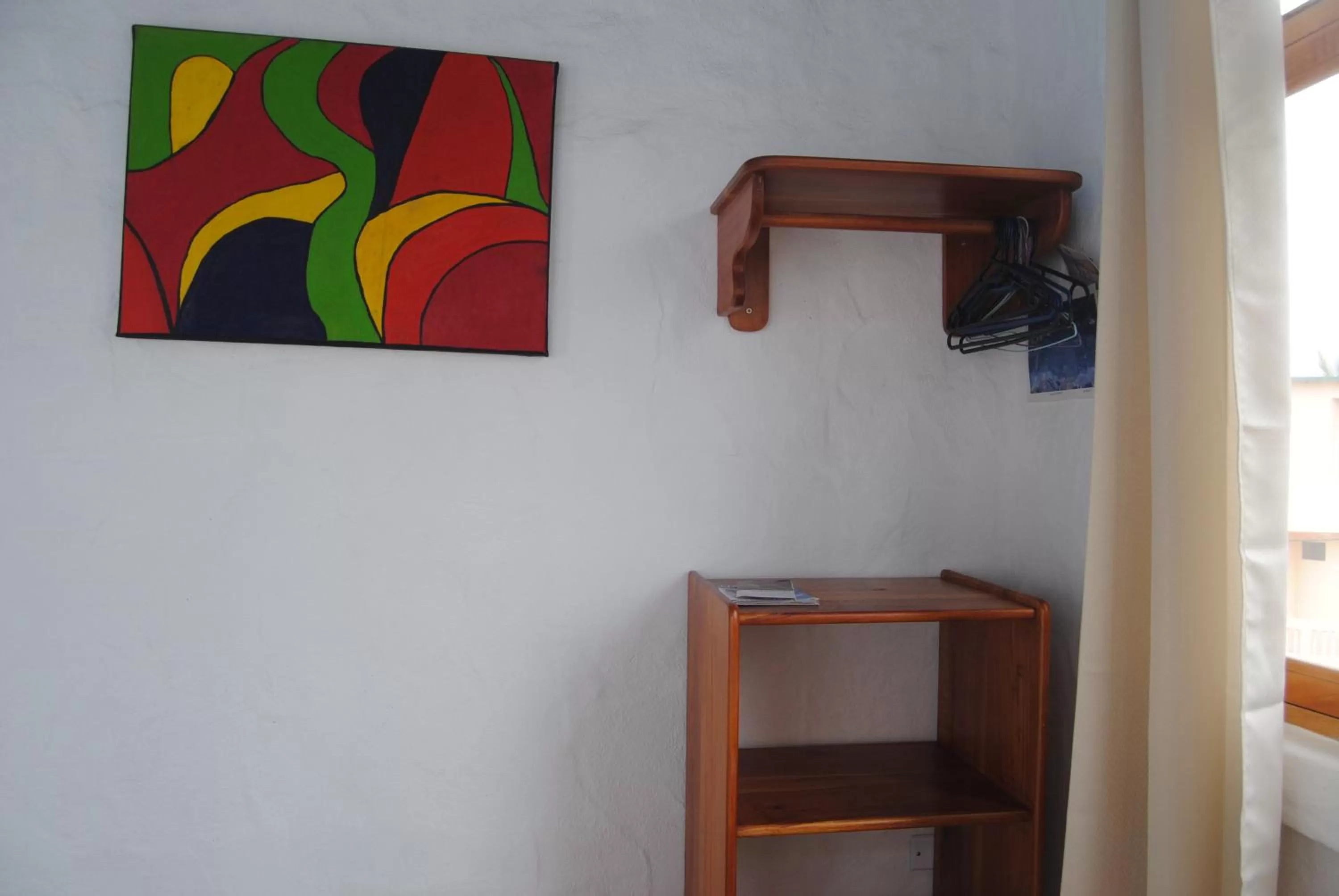 Decorative detail, TV/Entertainment Center in Hostal Galapagos by Bar de Beto