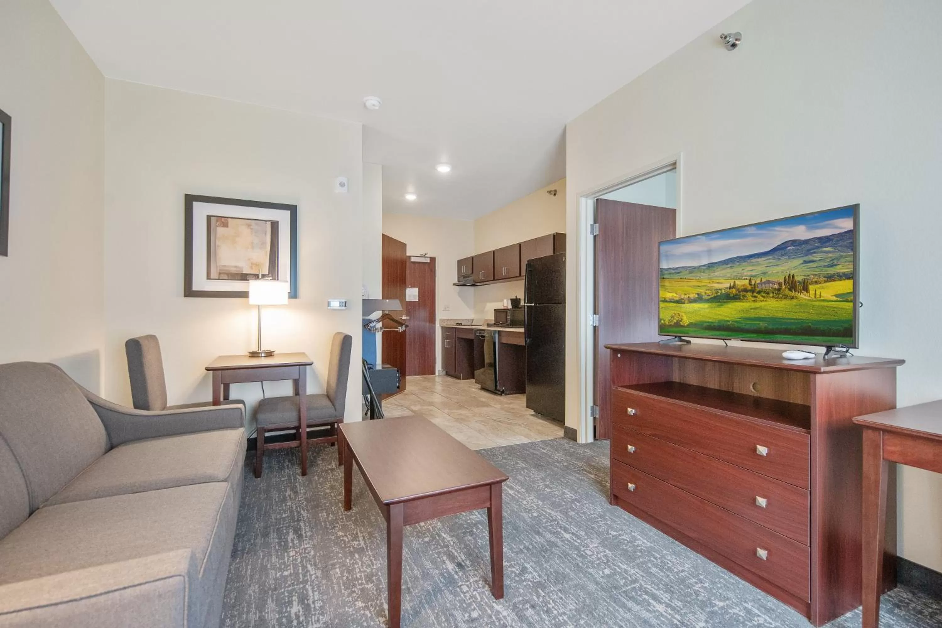 Kitchen or kitchenette in Cobblestone Hotel & Suites - Austin