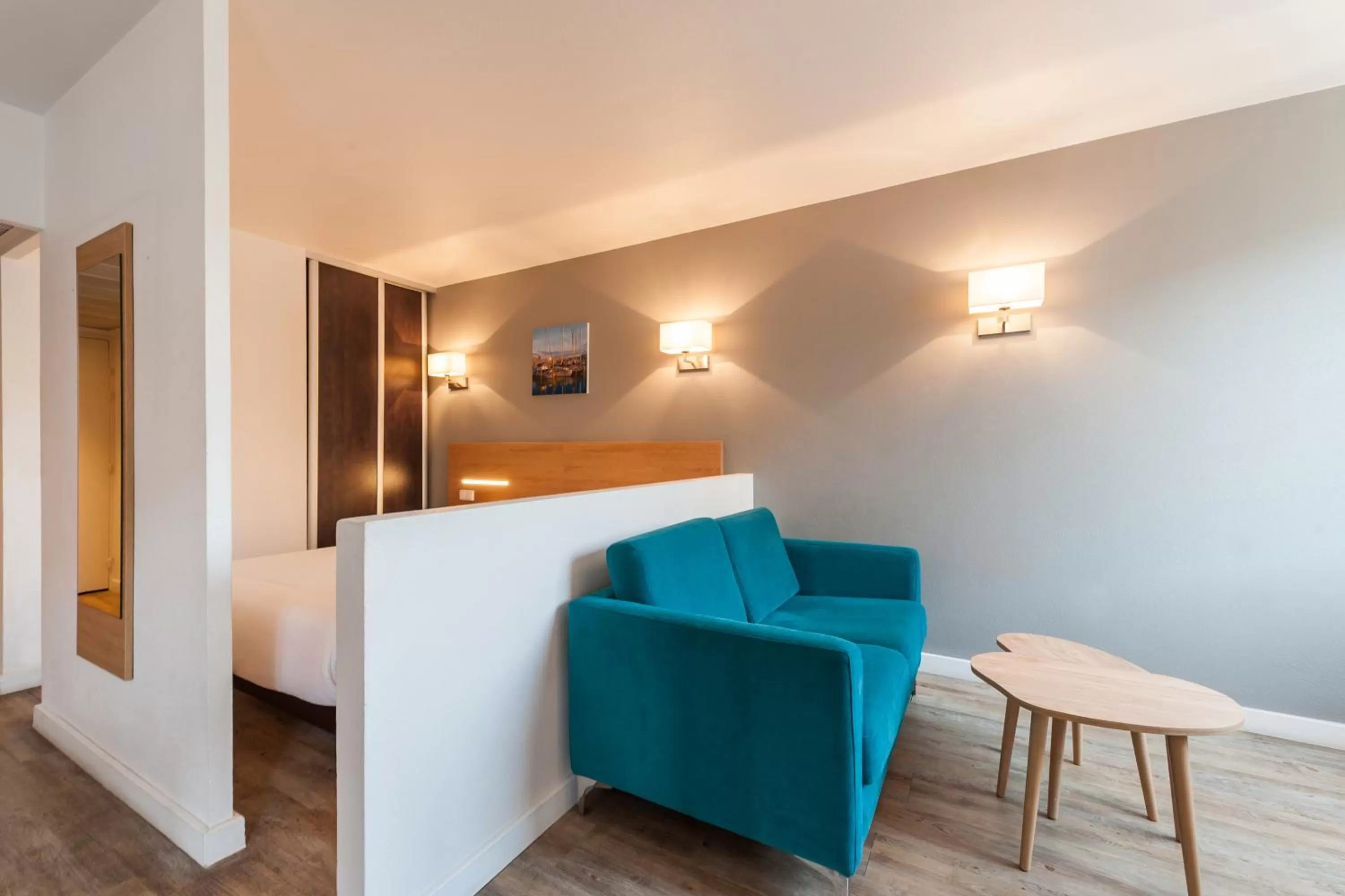 Living room, Bed in Residhotel Le Grand Prado