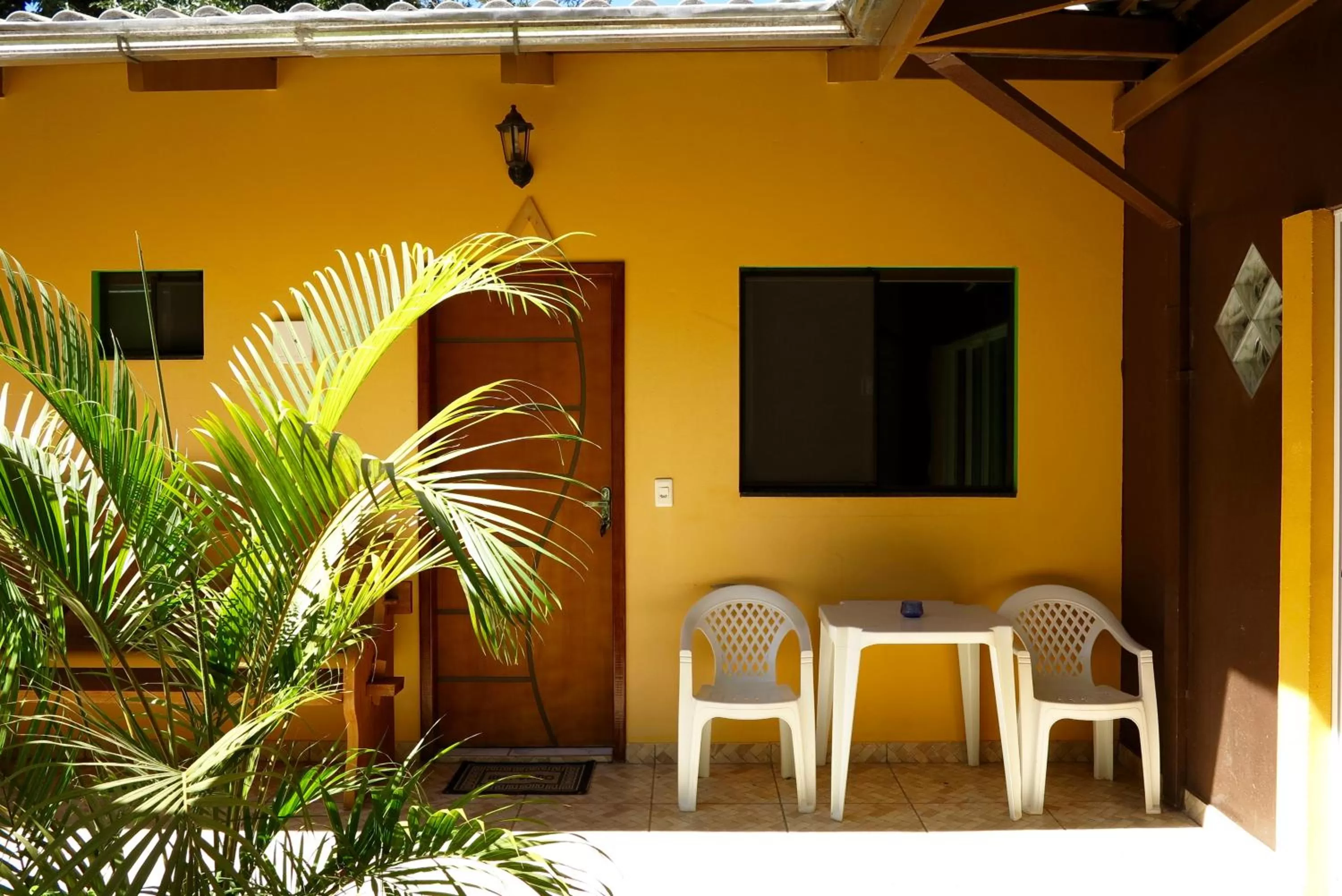 Property building, TV/Entertainment Center in Pousada Corazao Sagradao