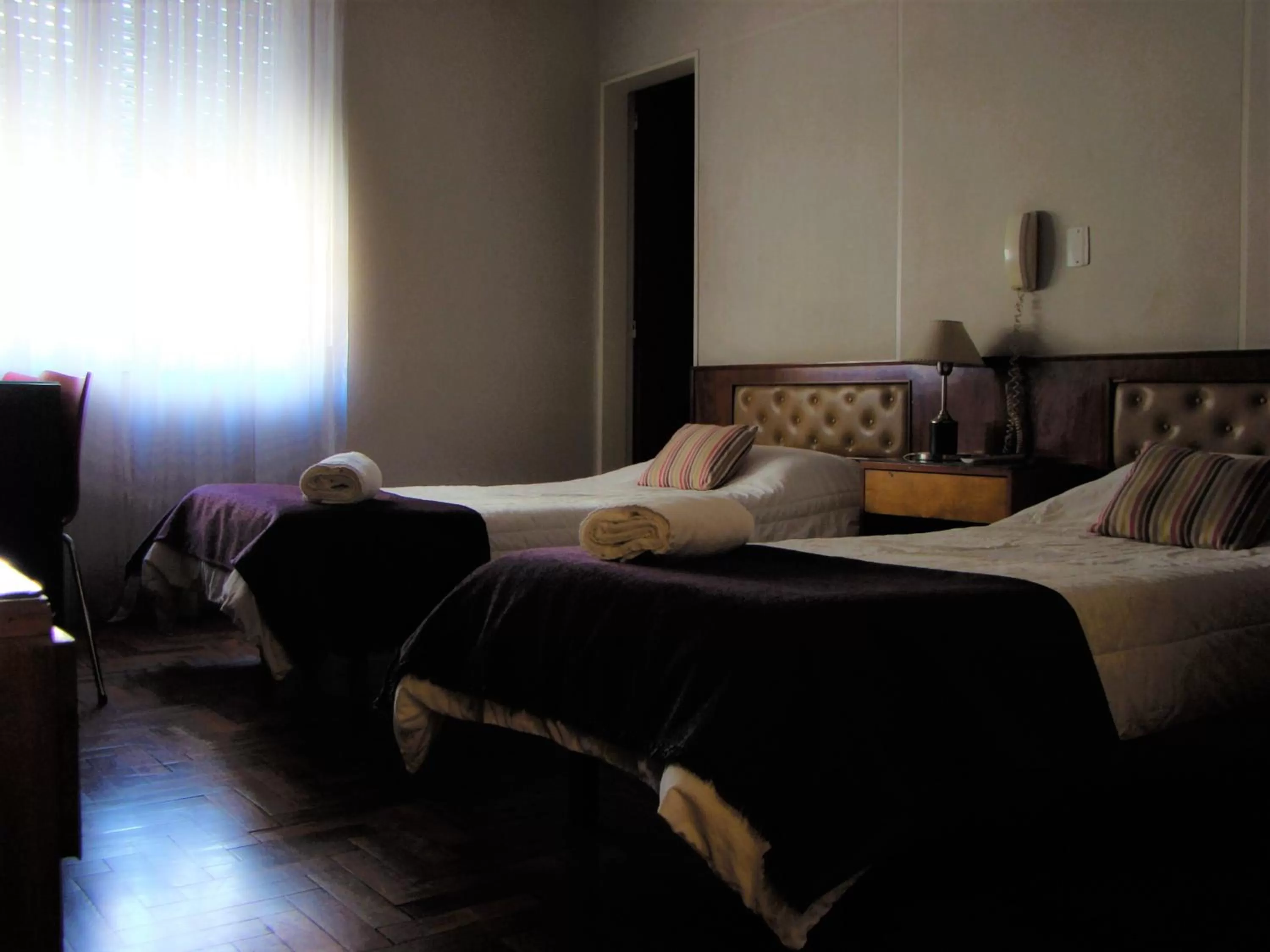 Bed in Petit Recoleta Suites