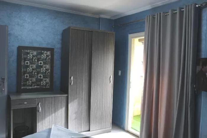 TV/Entertainment Center in Hostel Sunset Down town