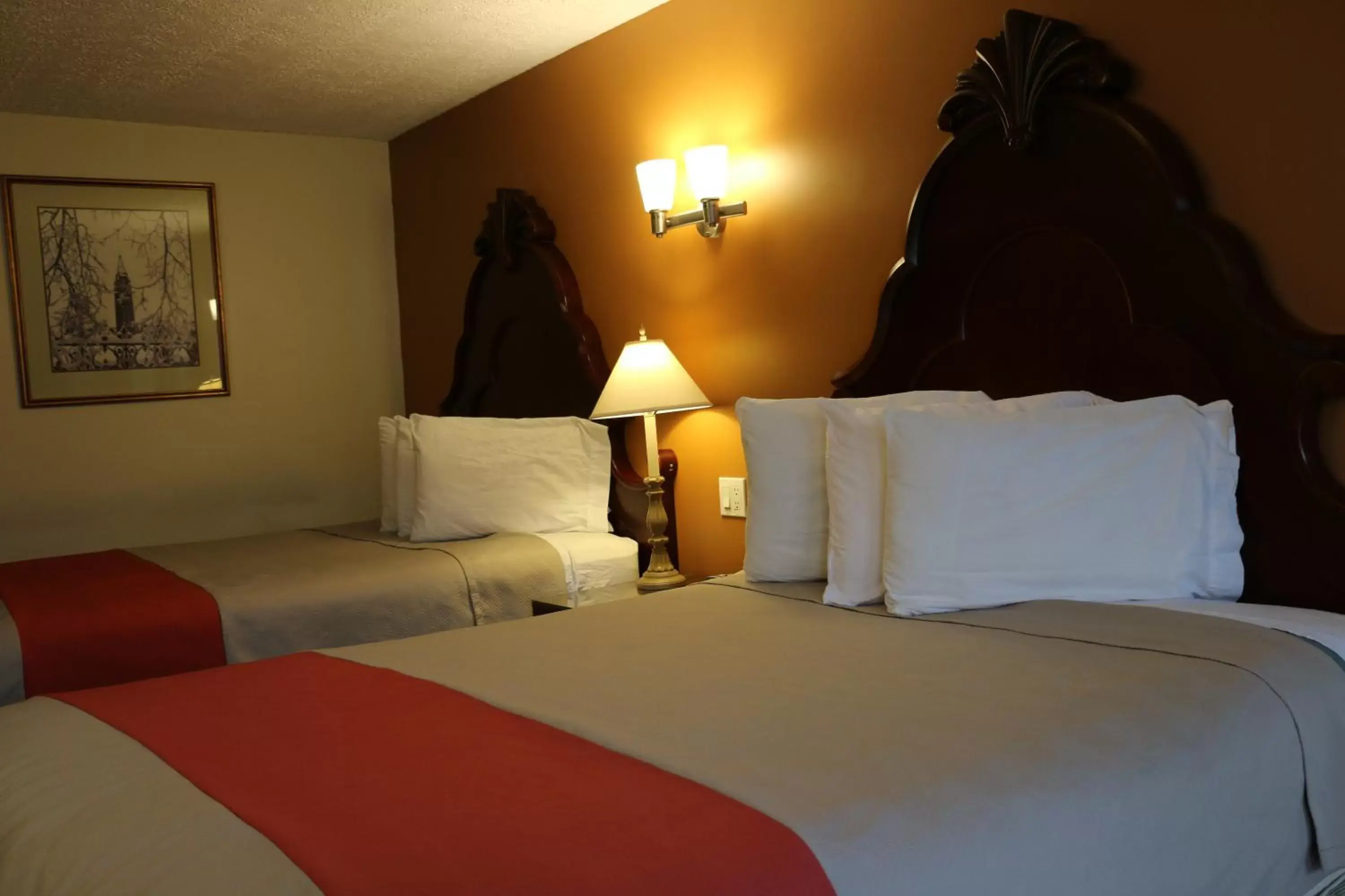 Queen Room with Two Queen Beds in Midtown Motel & Suites Queen Room with Two Queen Beds in Midtown Motel & Suites