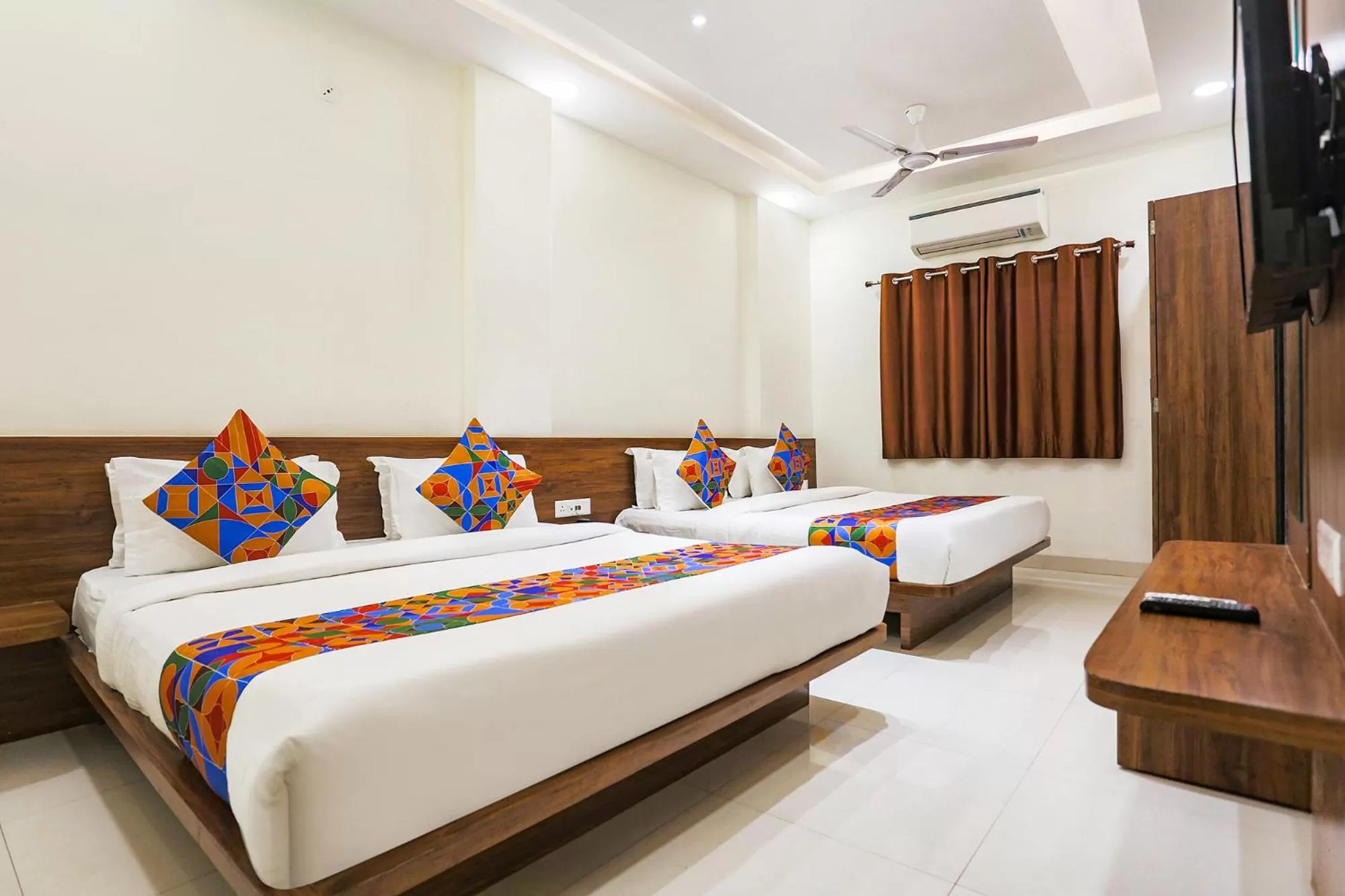 Bed in FabHotel Balaji Paradise