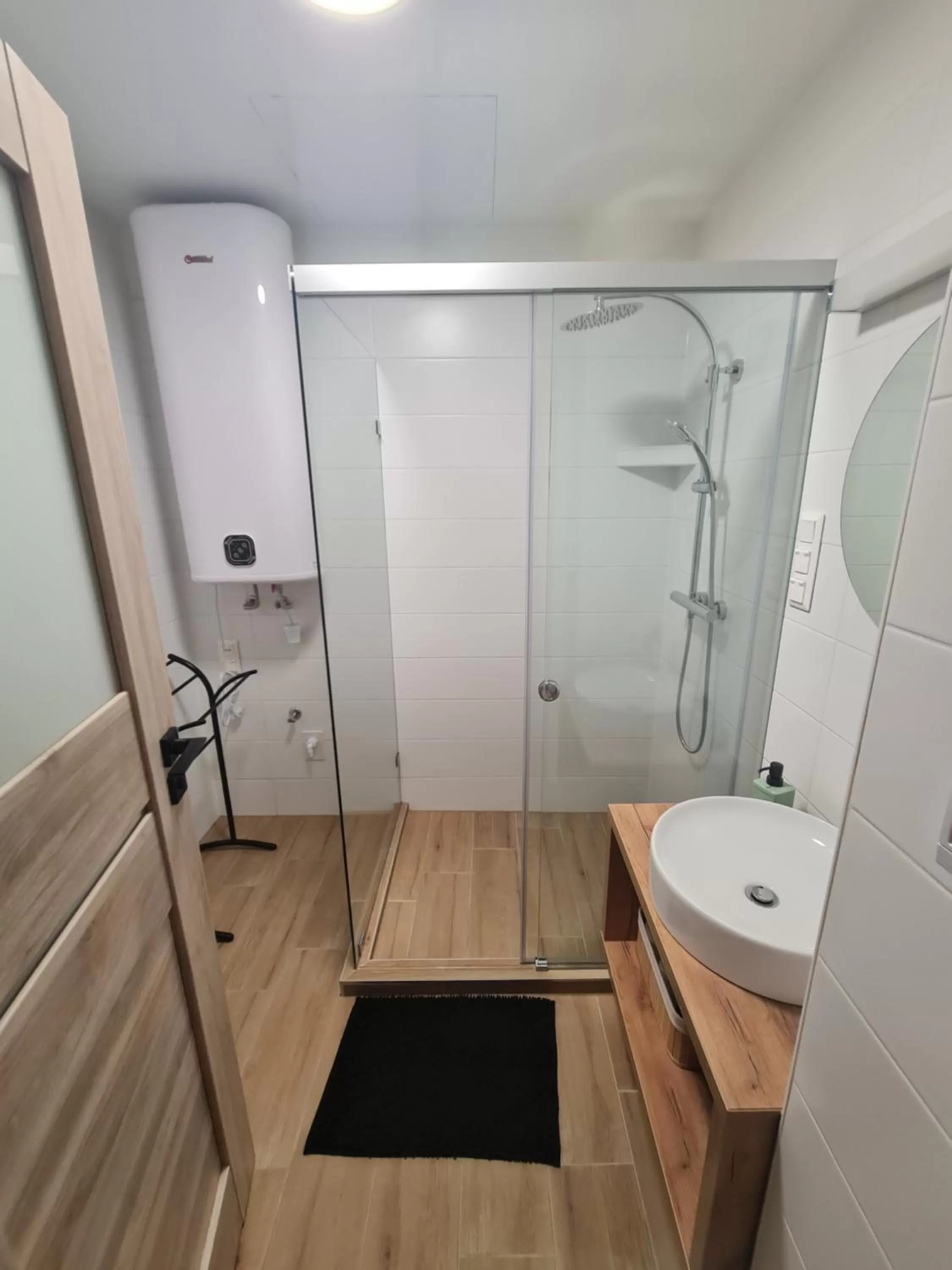 Shower in Rezidex Apartmanház