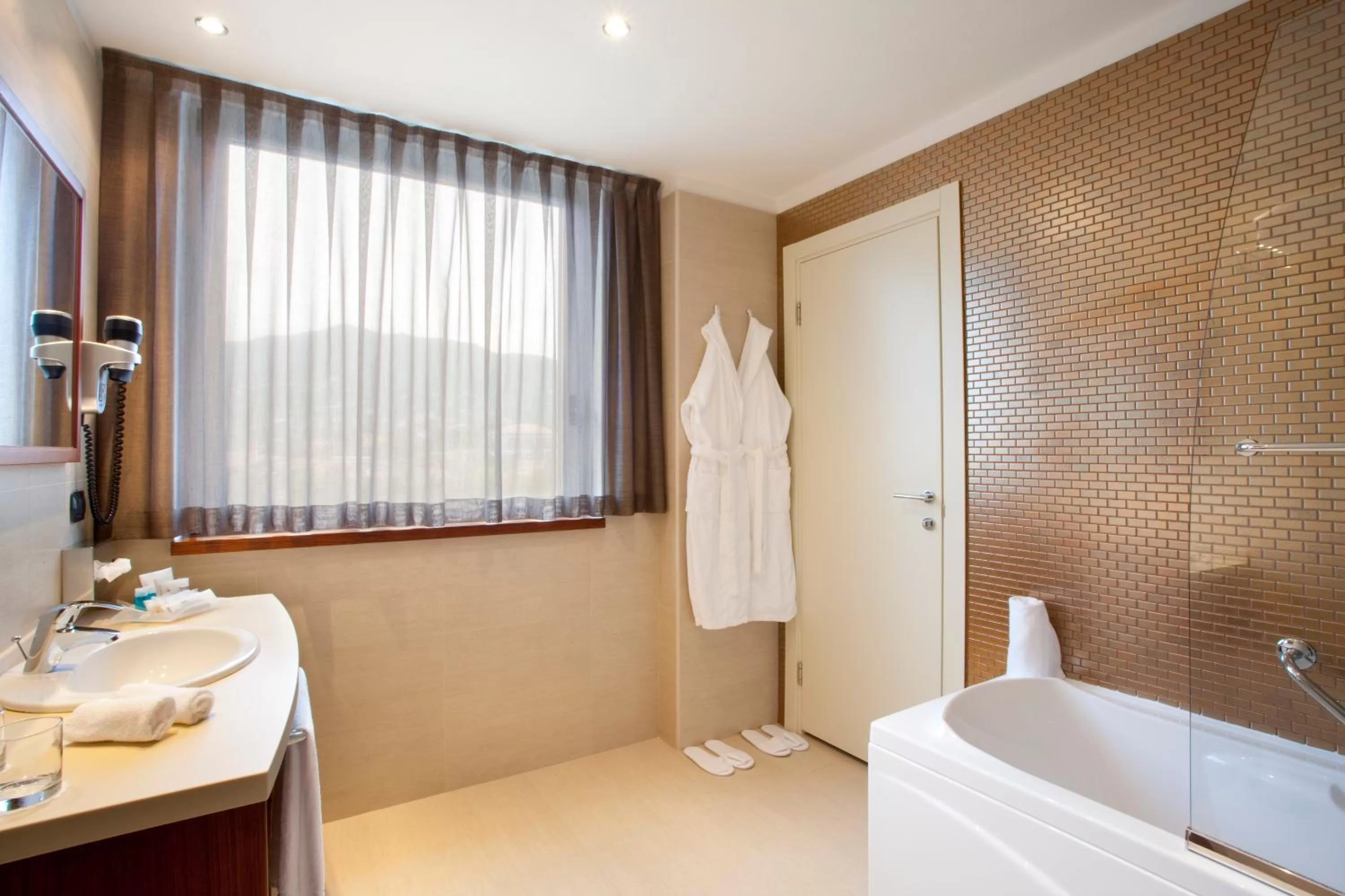 Bathroom in Holiday Inn Salerno-Cava De' Tirreni by IHG