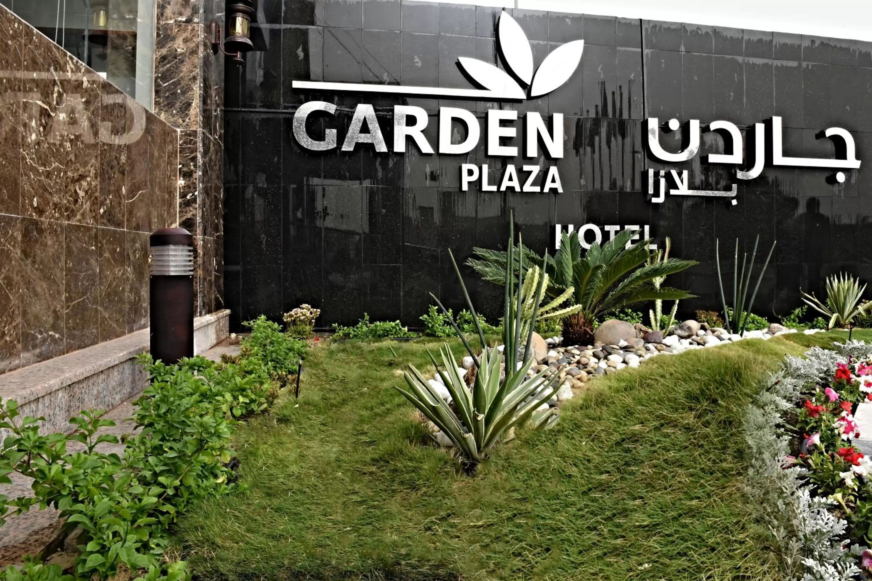 Property logo or sign in Garden Plaza Hotel