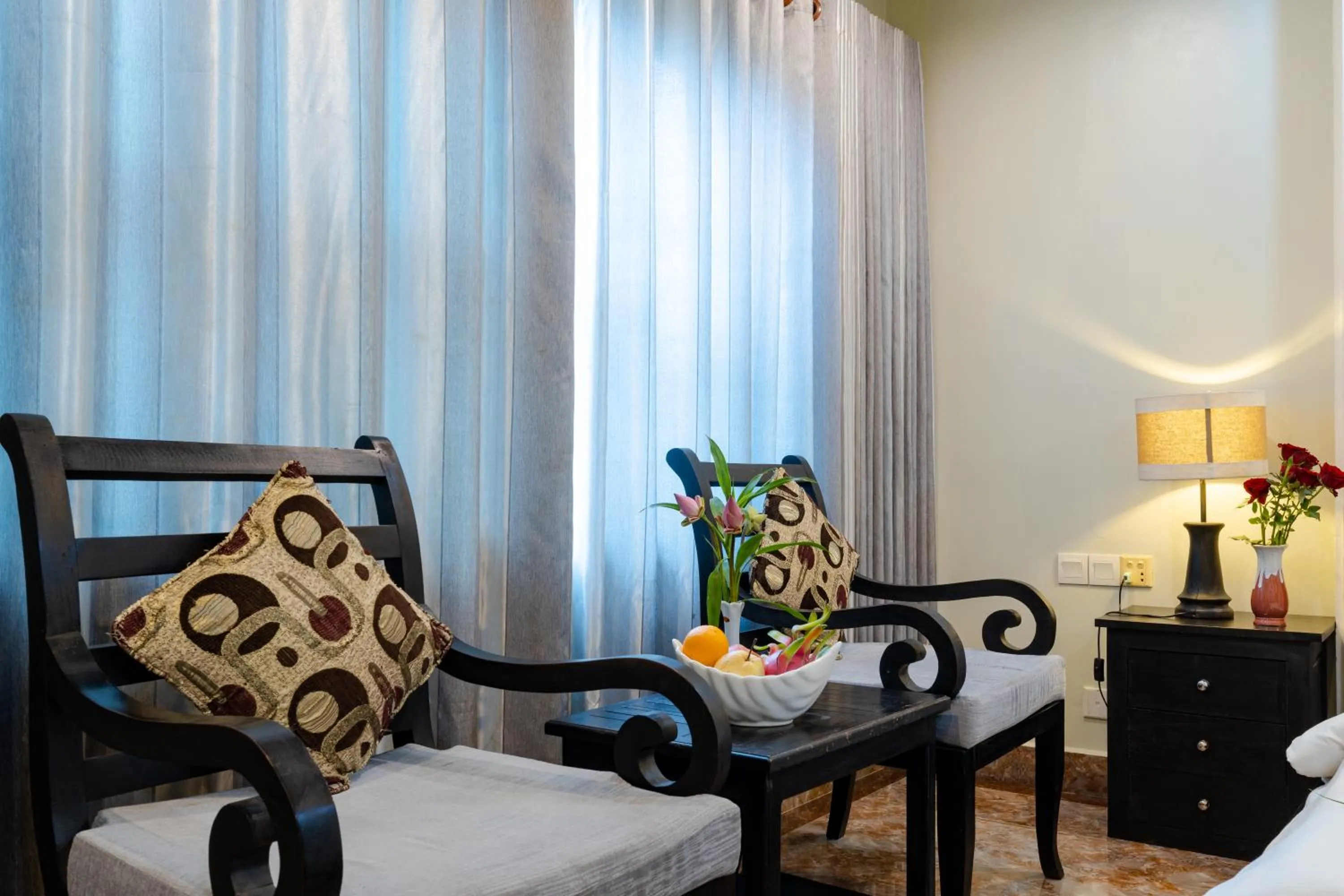 Seating area, Bed in Siem Reap Comforts Hostel