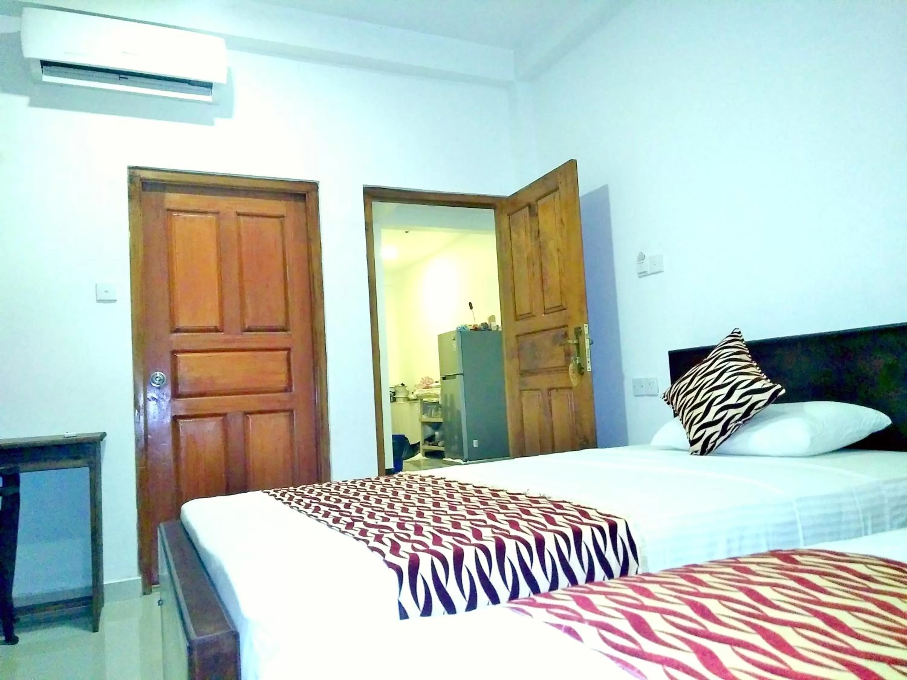 Bed in Ocean Bay Surf Resort Weligama