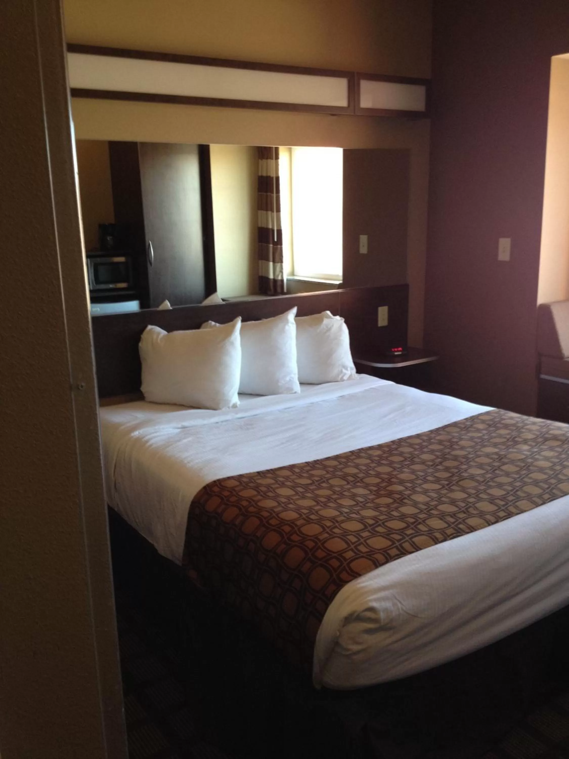 Bed in Microtel Inn & Suites