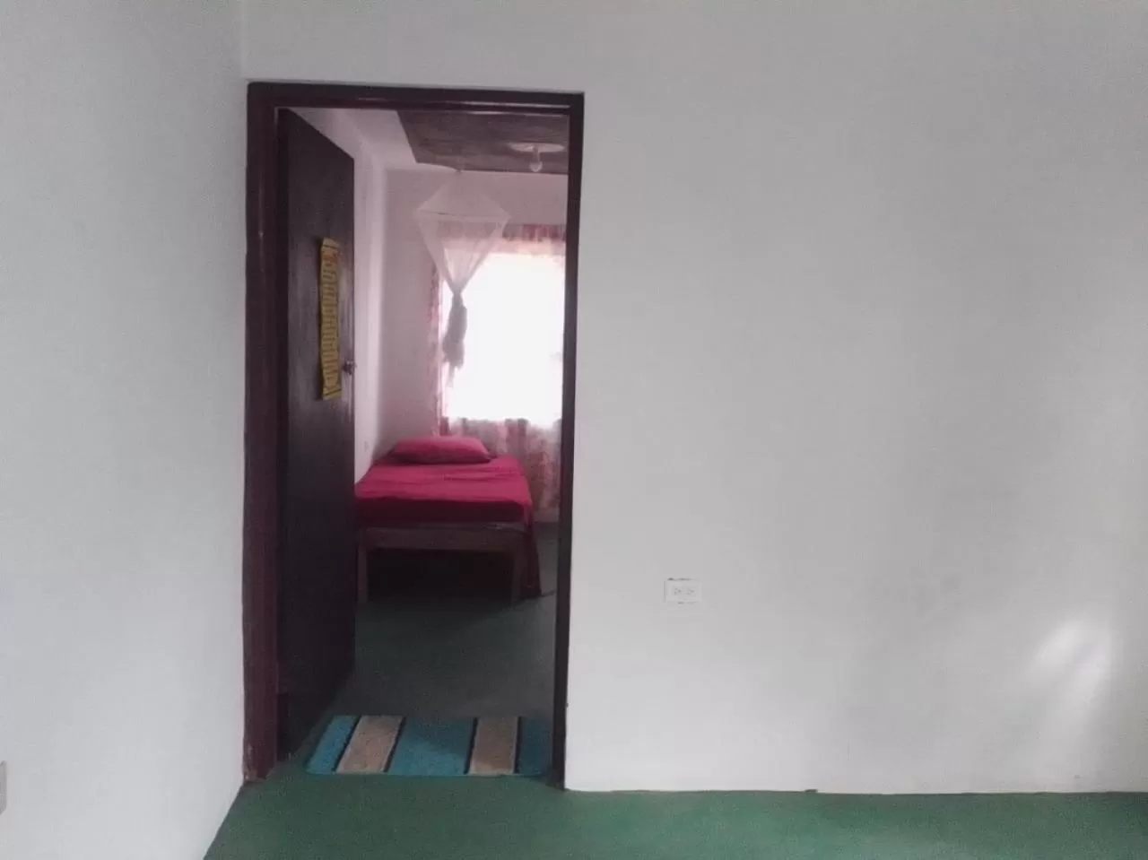 Bedroom, TV/Entertainment Center in Port Antonio Brian's Beach House