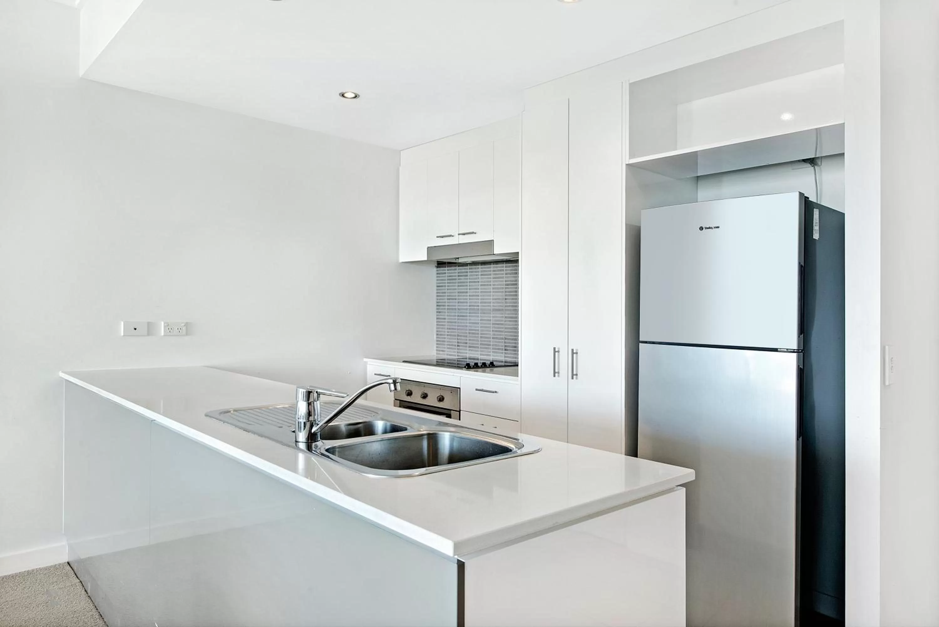 Kitchen or kitchenette in ULTIQA Freshwater Point Resort Broadbeach