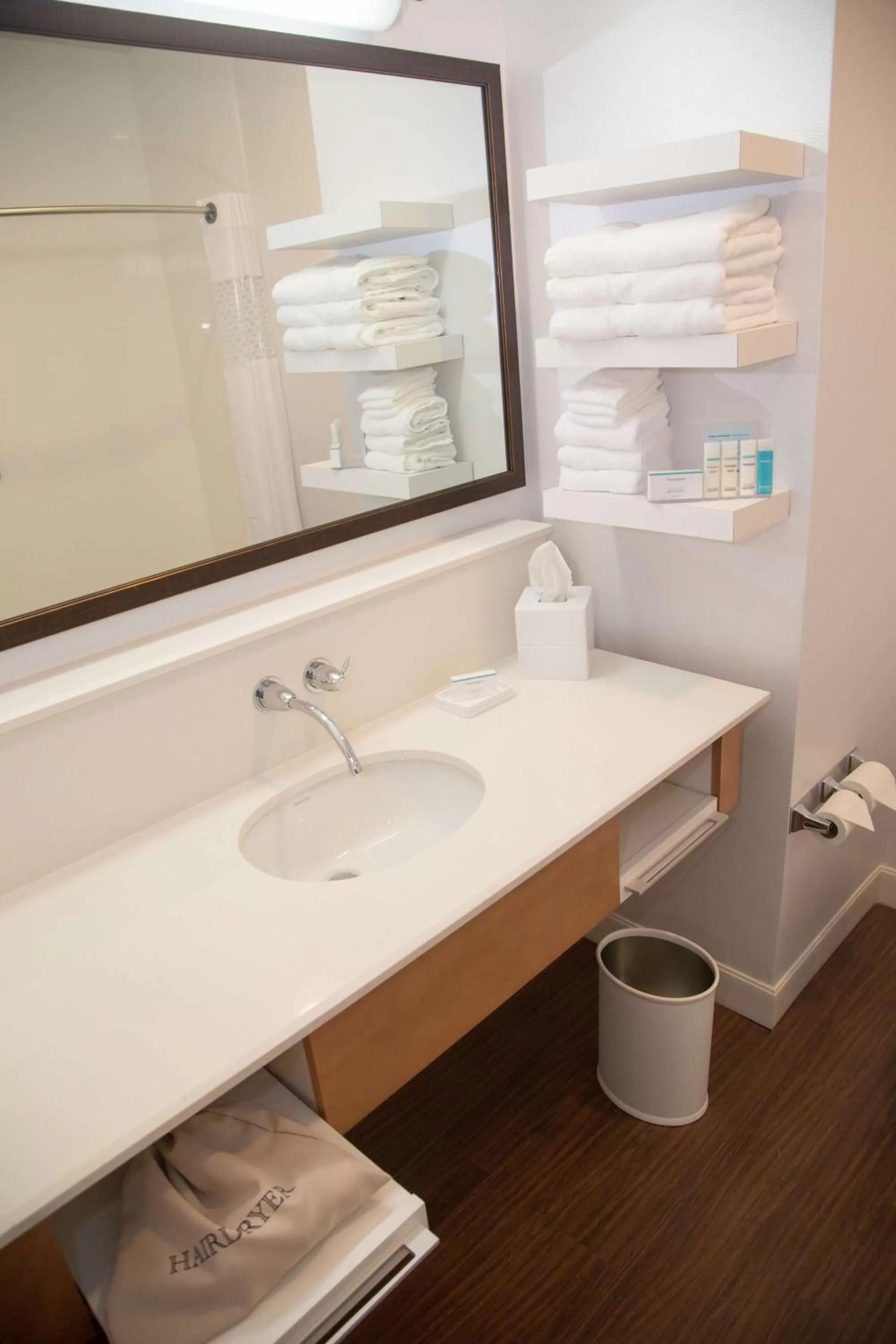 Bed in Hampton Inn and Suites by Hilton McKinney