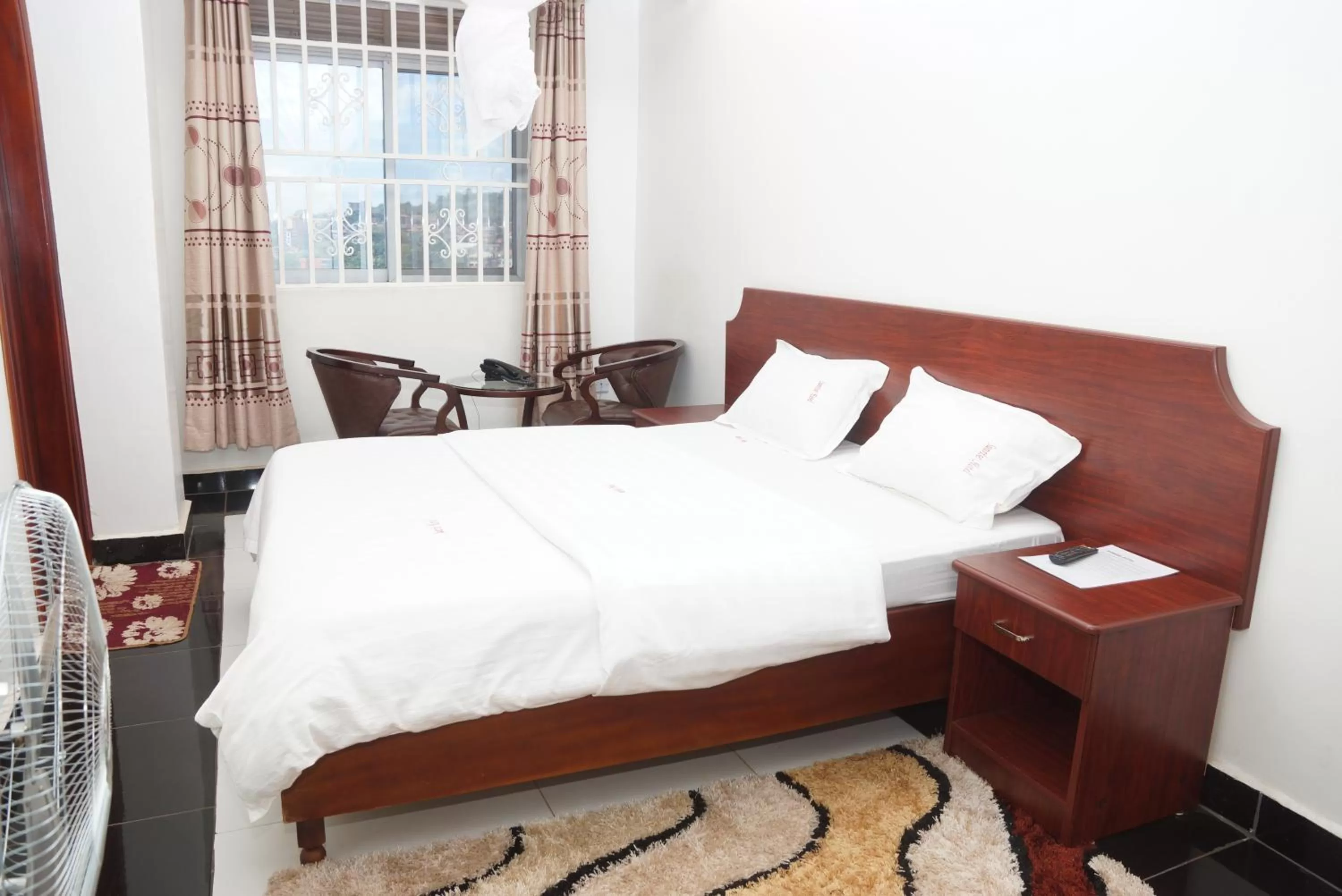 Bed in Sunrise Hotel Kampala