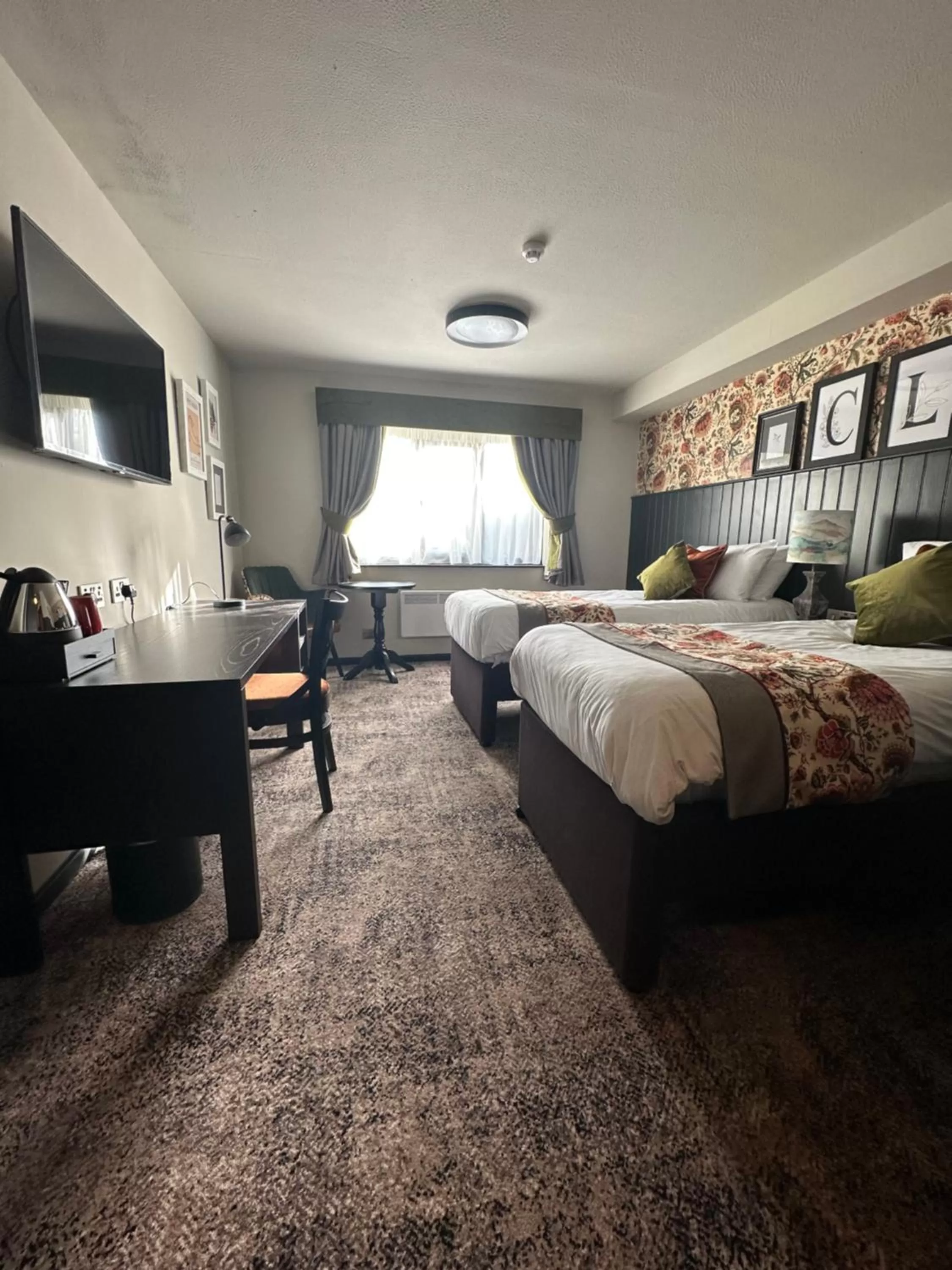 Photo of the whole room, Bed in Cat & Lion Country Pub and Hotel