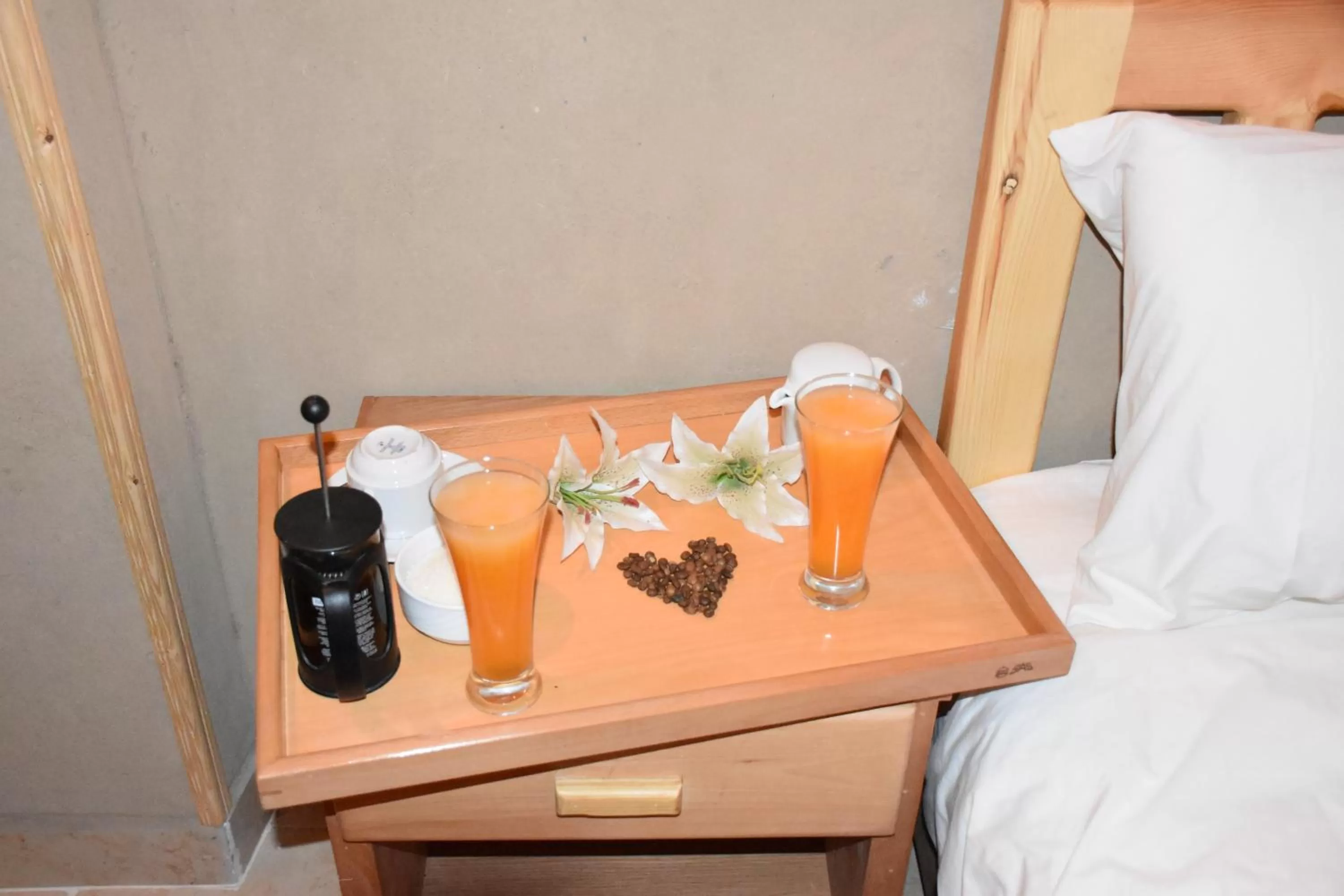 Bed in Embrace Hotel