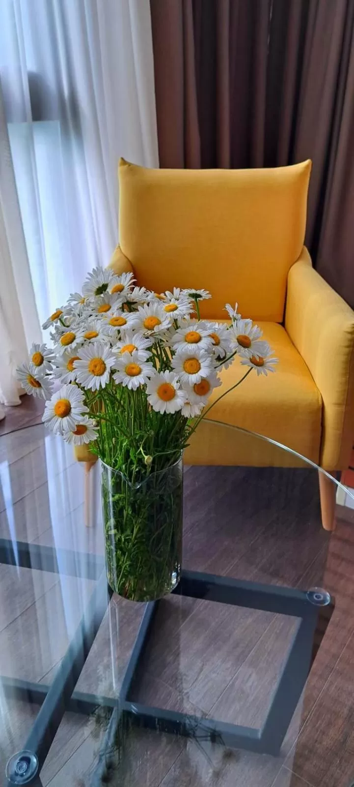 Seating area, Bed in Bricks Hotel