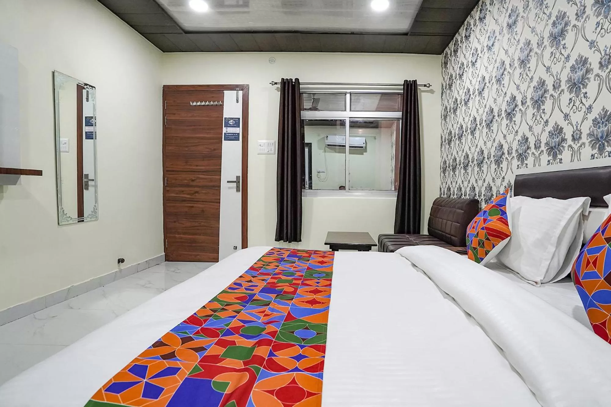 Bed in FabHotel Rajdhani