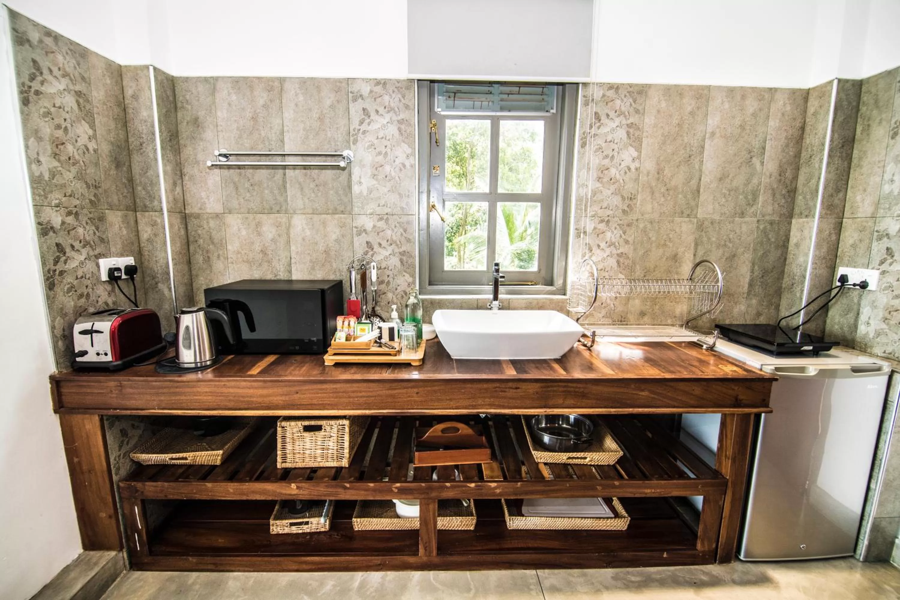 Kitchen or kitchenette in Ella Planters Bungalow